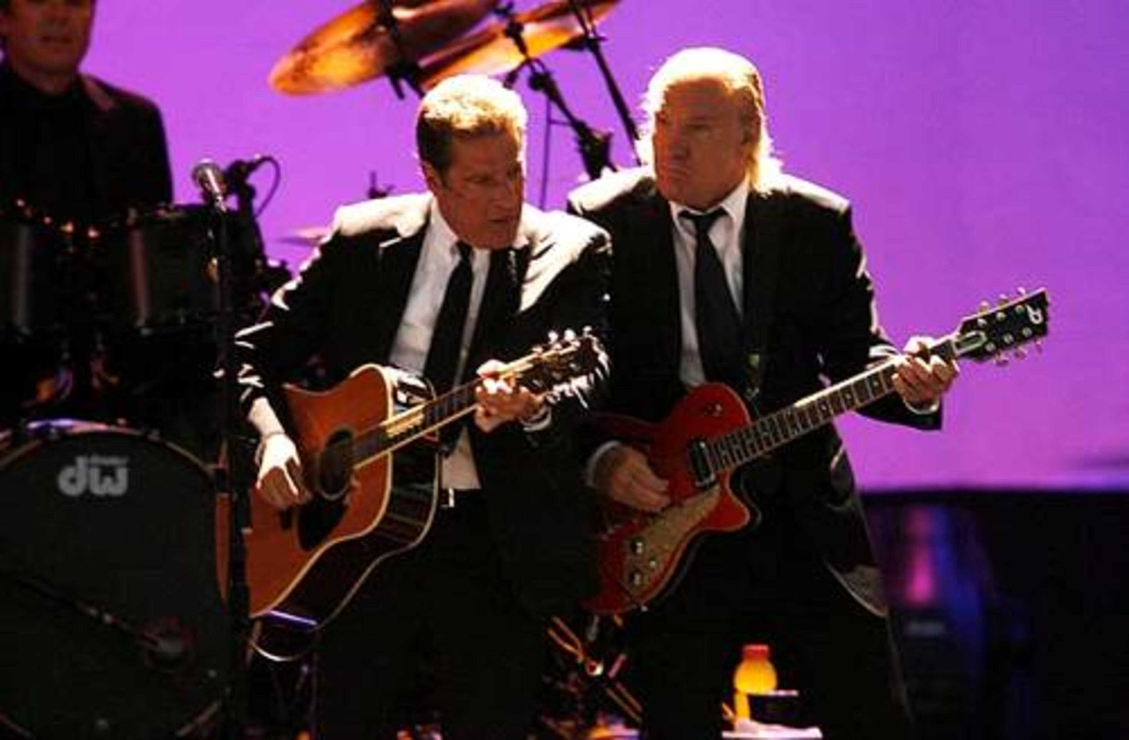 Longtime Eagles Glenn Frey and Joe Walsh do a little jamming.