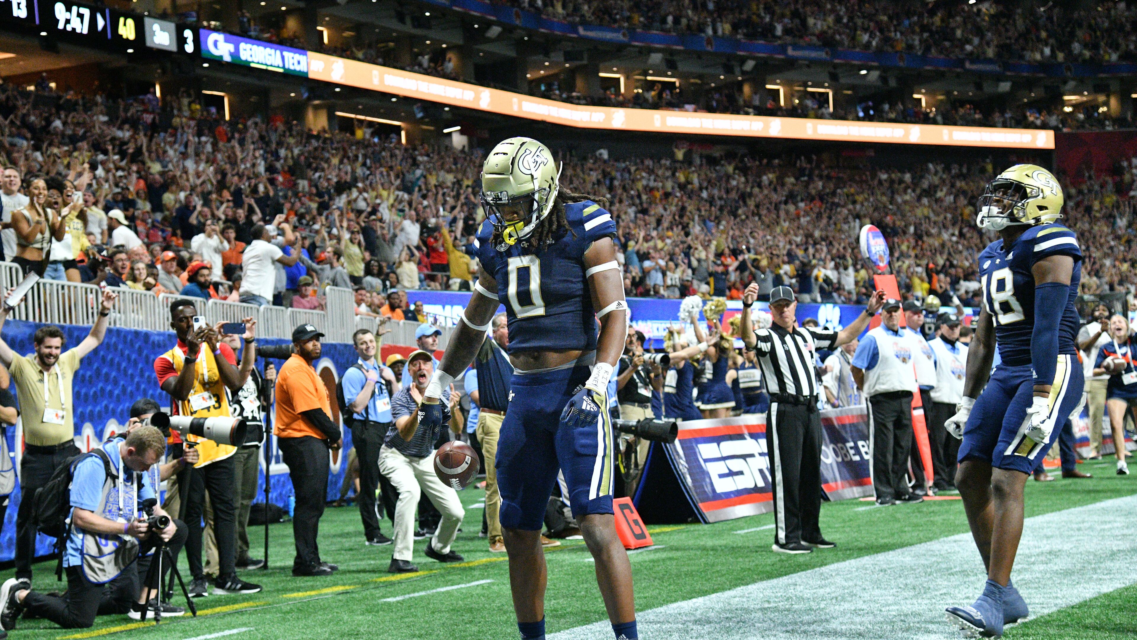 Georgia Tech's wide receiver E.J. Jenkins (0) celebrates after scoring a touchdown past Clemson's safety Andrew Mukuba (1) during the second half of Chick-fil-A Kickoff Game at Mercedes-Benz Stadium in Atlanta on Sept. 5, 2022. Clemson won 41-10 over Georgia Tech. (Hyosub Shin / Hyosub.Shin@ajc.com)
