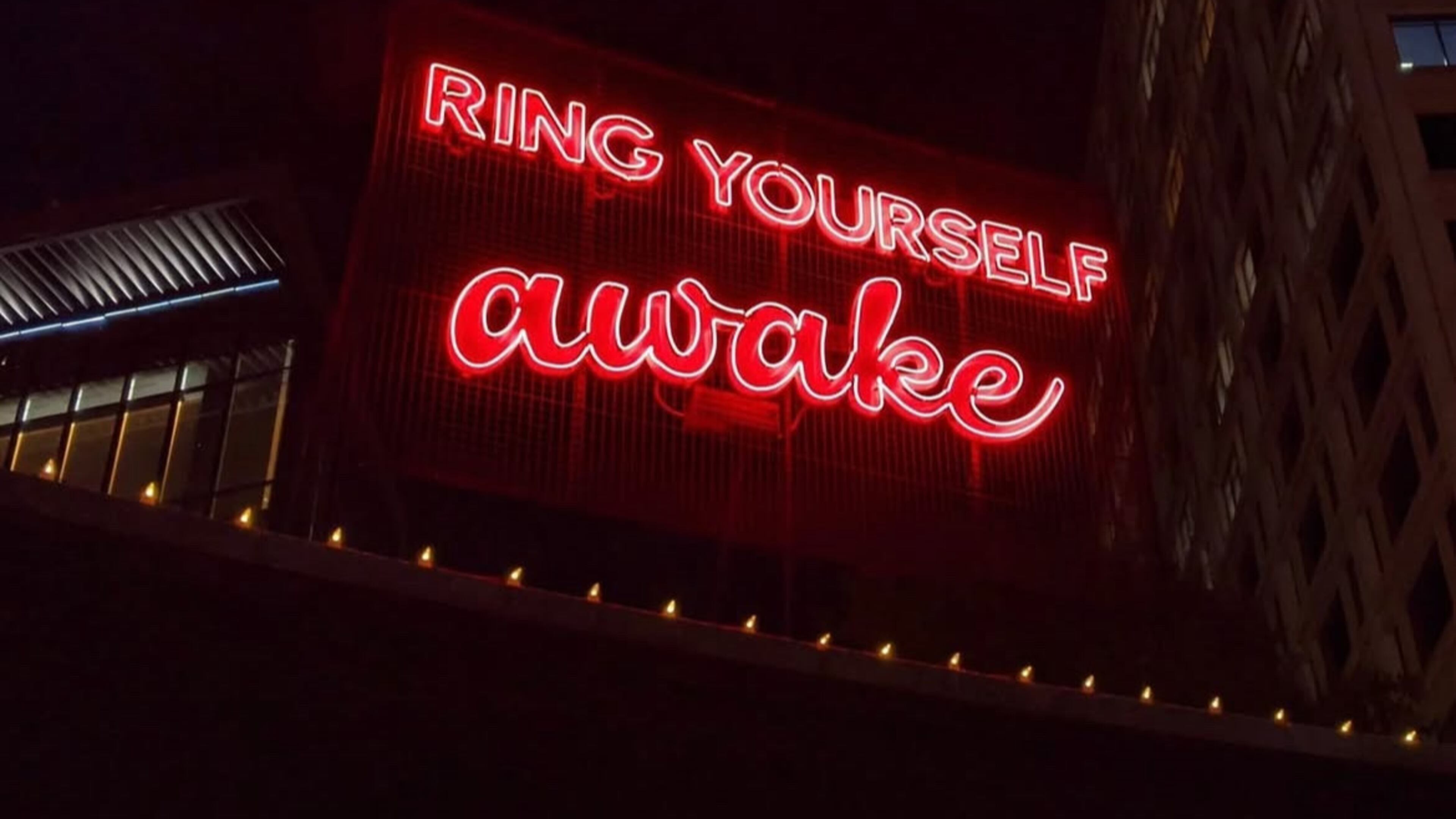 Poet Theresa Davis' words are illuminated in neon at the Goat Farm as part of the "Neon Poetry" project. (Courtesy of Theresa Davis)