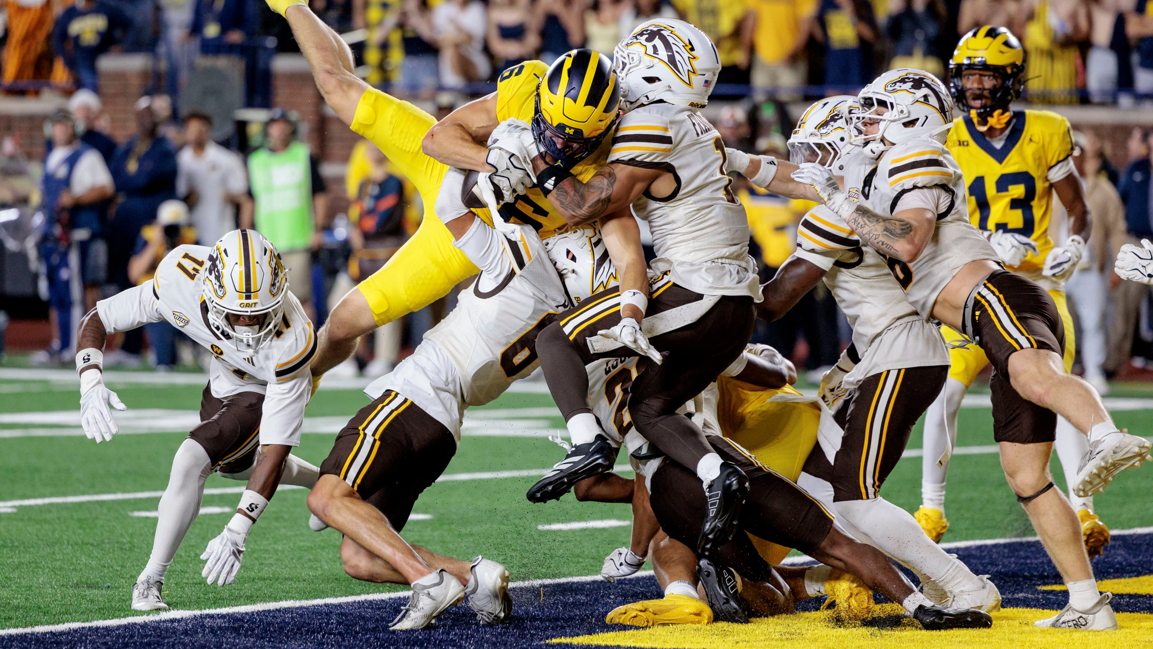 Michigan's wide receiver JJ Buchanan (6) makes the game-winning catch to win over Western Michigan with a last-second touchdown during an NCAA college football game in Ann Arbor, Mich., Saturday, Sept. 5 2026. (Jacob Hamilton/Ann Arbor News via AP)