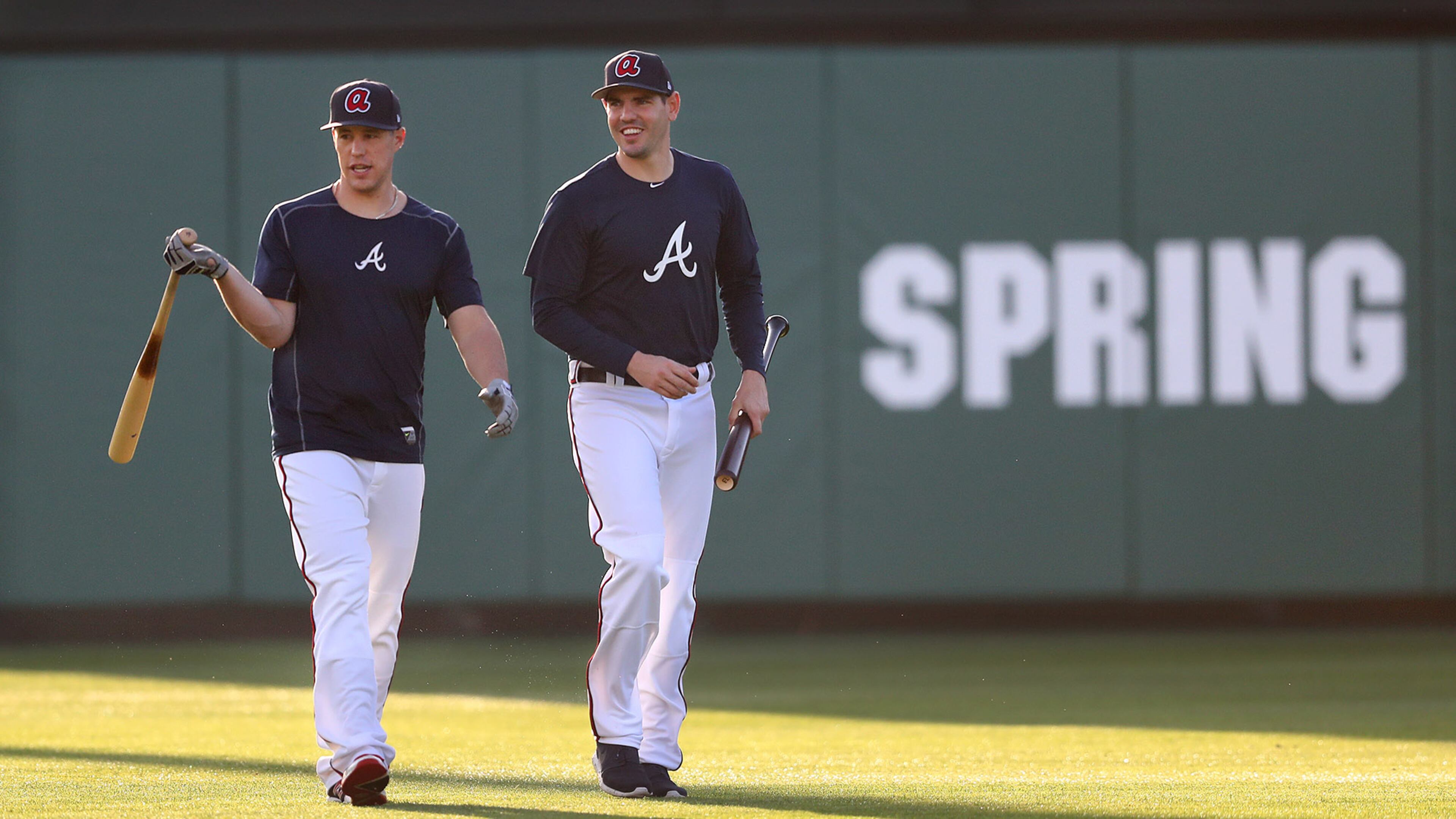 February 15, 2017, Lake Buena Vista, FL: Braves catchers Blake Lalli (left) and Braeden Schlehuber make their way across the Champion Stadium field after taking some batting practice as Braves pitchers and catchers hold their first workout on Wednesday Feb. 15, 2017, at the ESPN Wide World of Sports in Lake Buena Vista. Curtis Compton/ccompton@ajc.com