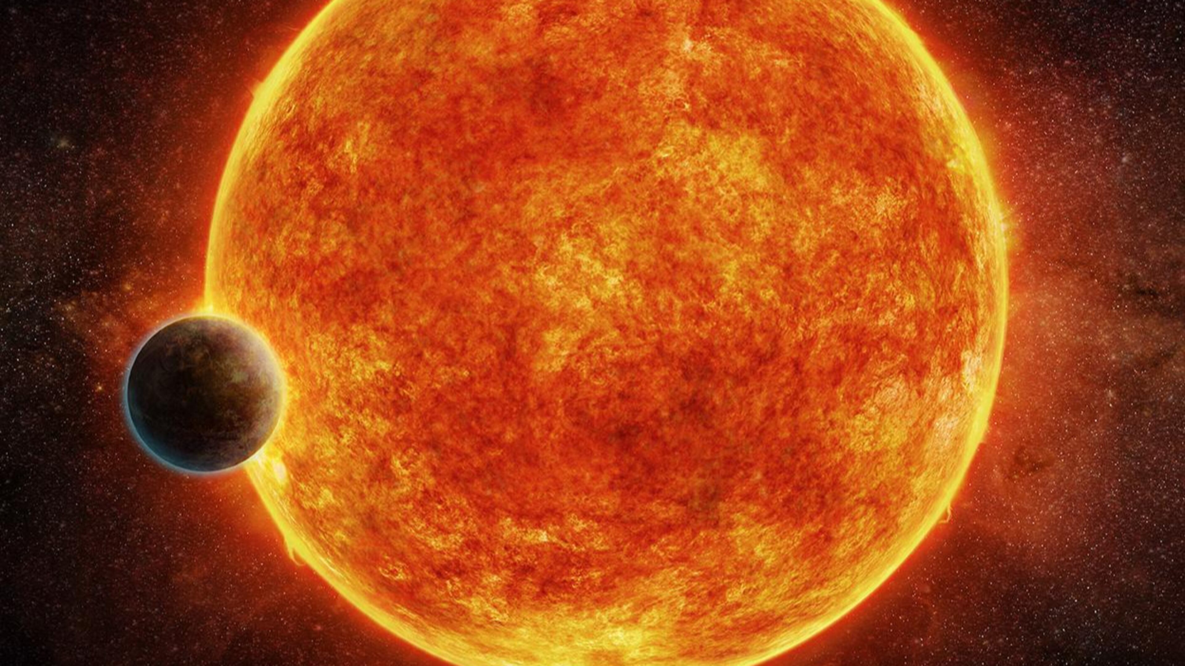 An artist’s conception of a newly discovered rocky planet, named LHS 1140b, that is located 39 light-years from Earth in the habitable zone where liquid water could exist. The planet is almost seven times larger than Earth and is seen here passing in front of its star.