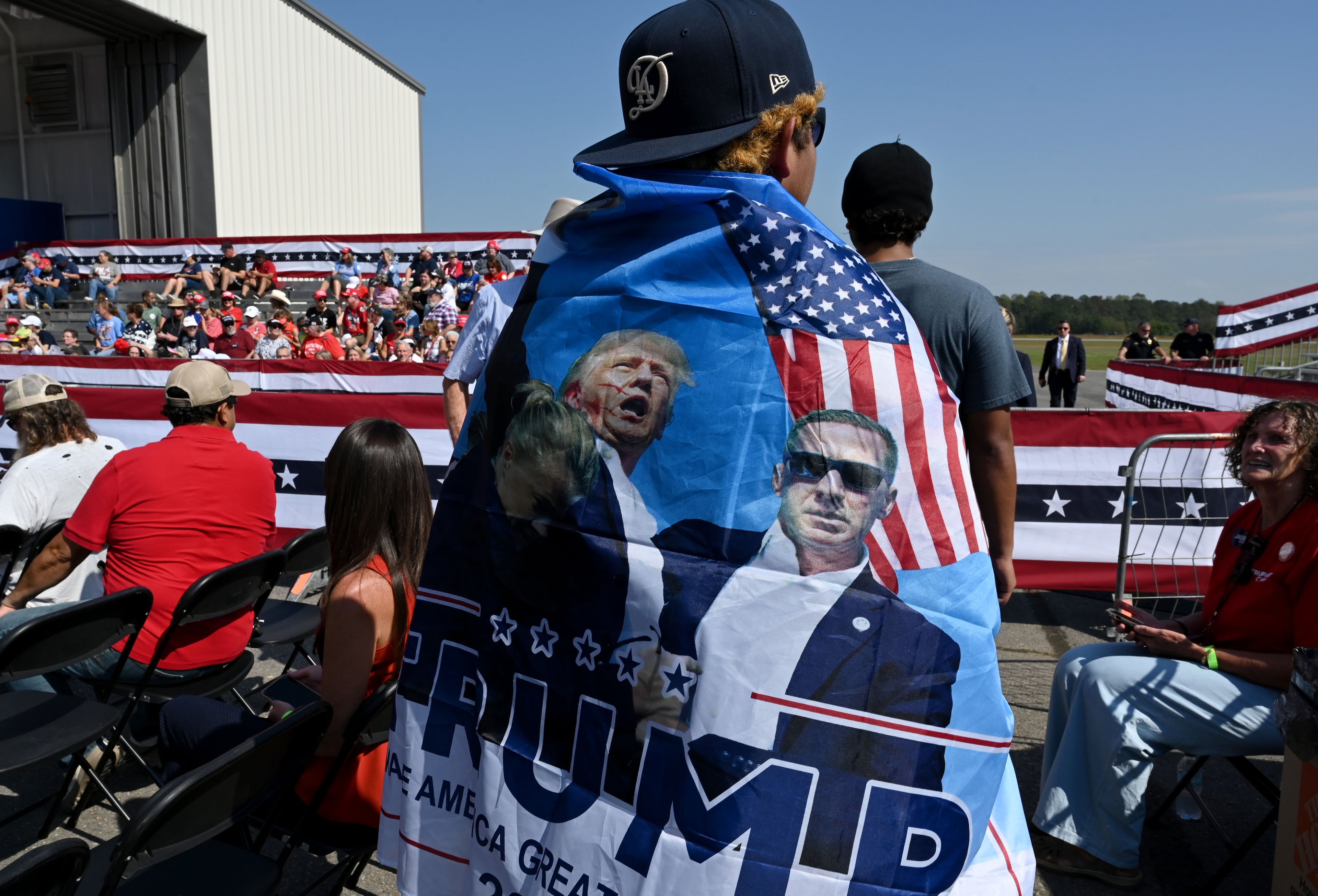 A supporter enters before a campaign rally at Dalton Municipal Airport on Friday, Oct. 16, 2026, in Dalton. (Hyosub Shin/AJC)