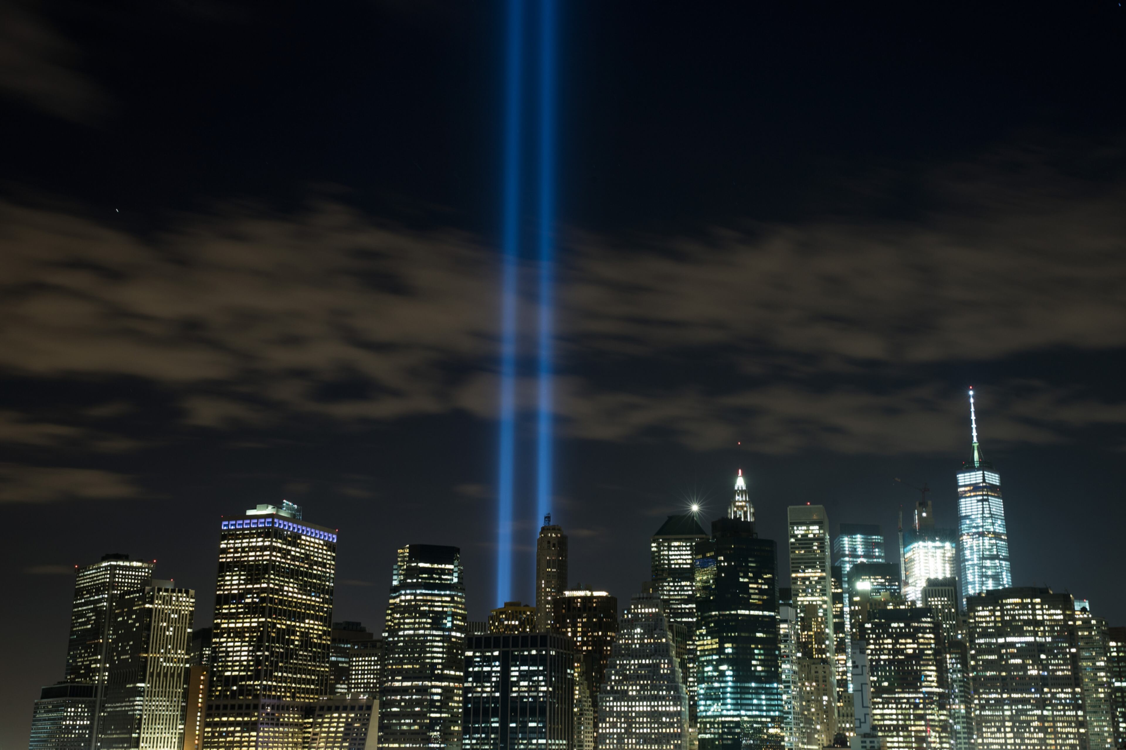 NEW YORK, NY - SEPTEMBER 7: The 'Tribute in Light' rises from the Lower Manhattan skyline as seen from the Brooklyn Heights Promenade, September 7, 2016 in the Brooklyn borough of New York City. The lights were being tested in advance of the 15th anniversary of the September 11 terrorist attacks. (Photo by Drew Angerer/Getty Images) *** BESTPIX ***
