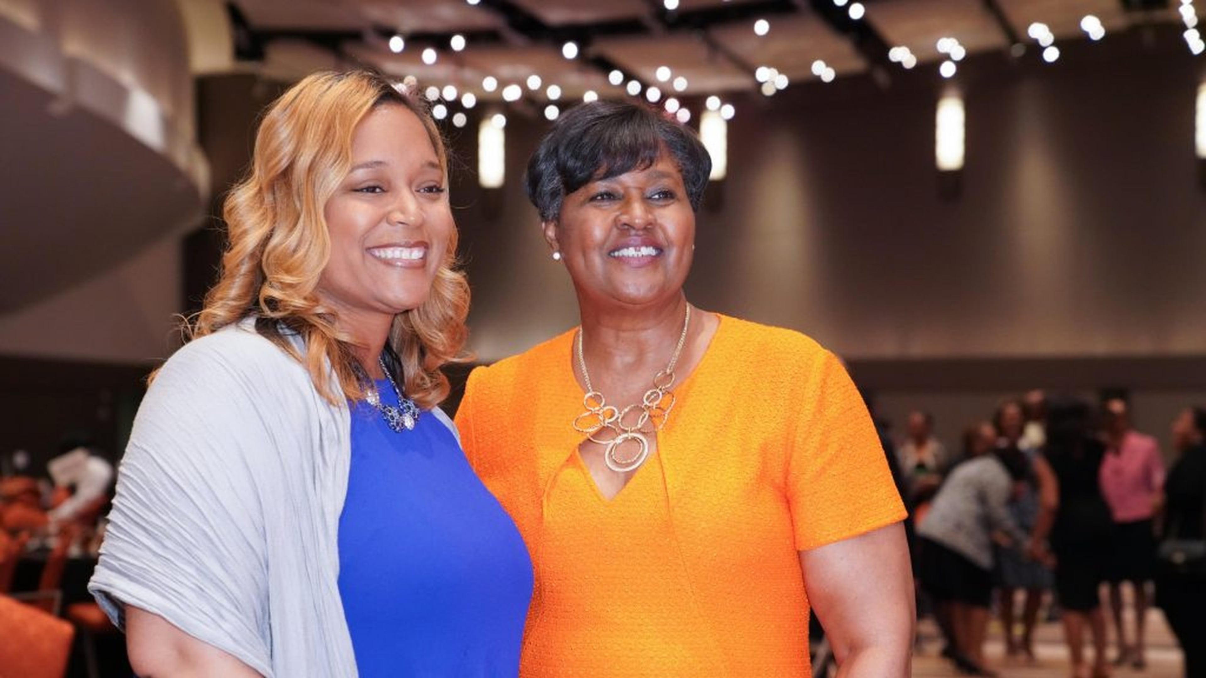 Melissa Waller (left), pictured here with Sharmen Gowens, CEO of the YWCA of Greater Atlanta, shared her story of domestic violence at the YWCA s 35th annual Salute to Women of Achievement in April. CONTRIBUTED BY CASEY MCDANIEL WRIGHT