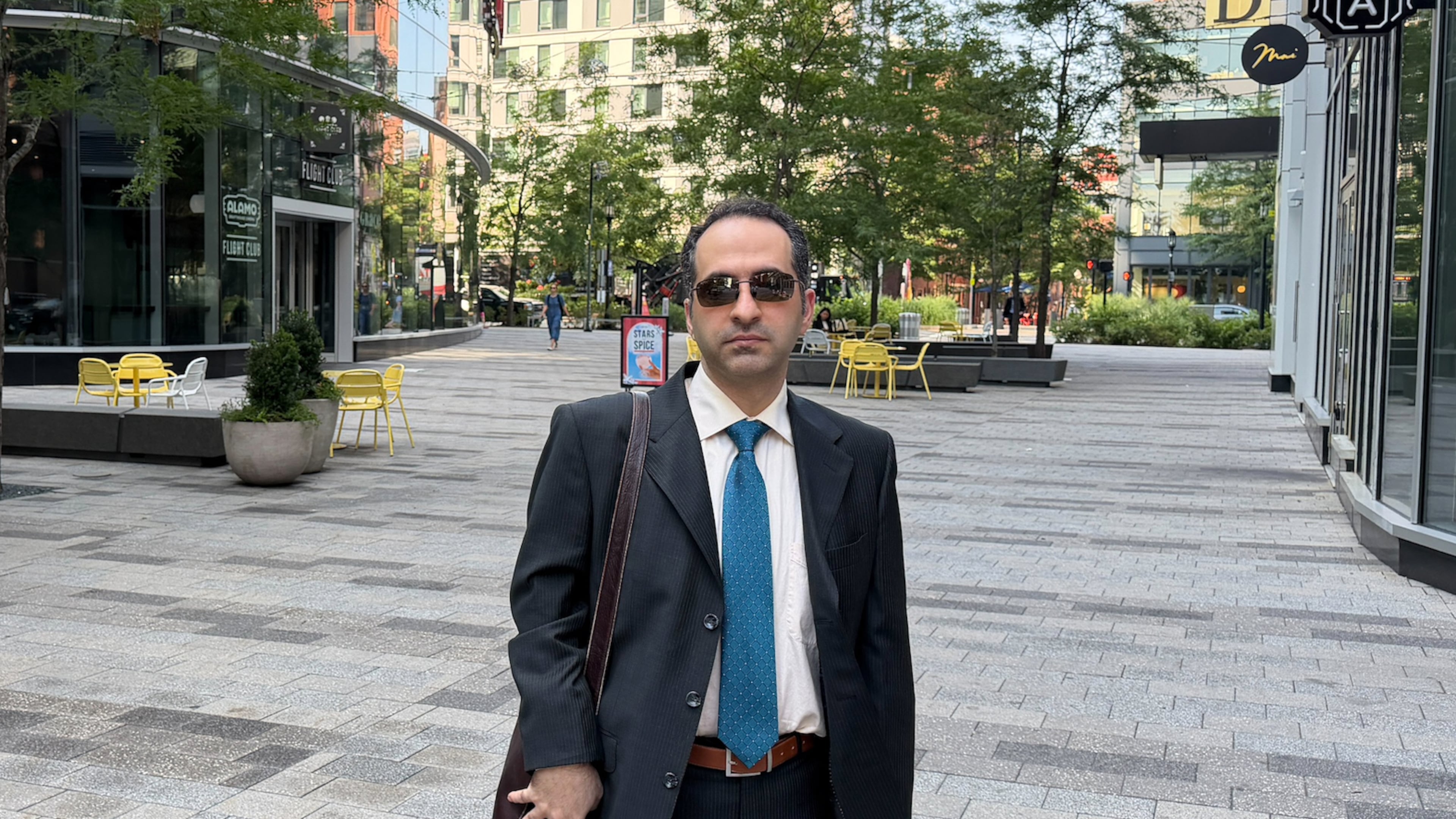 Iranian American defendant Mahdi Mohammad Sadeghi poses for a photo Friday, July 10, 2026, before heading into federal court in Boston. (AP Photo/Michael Casey)