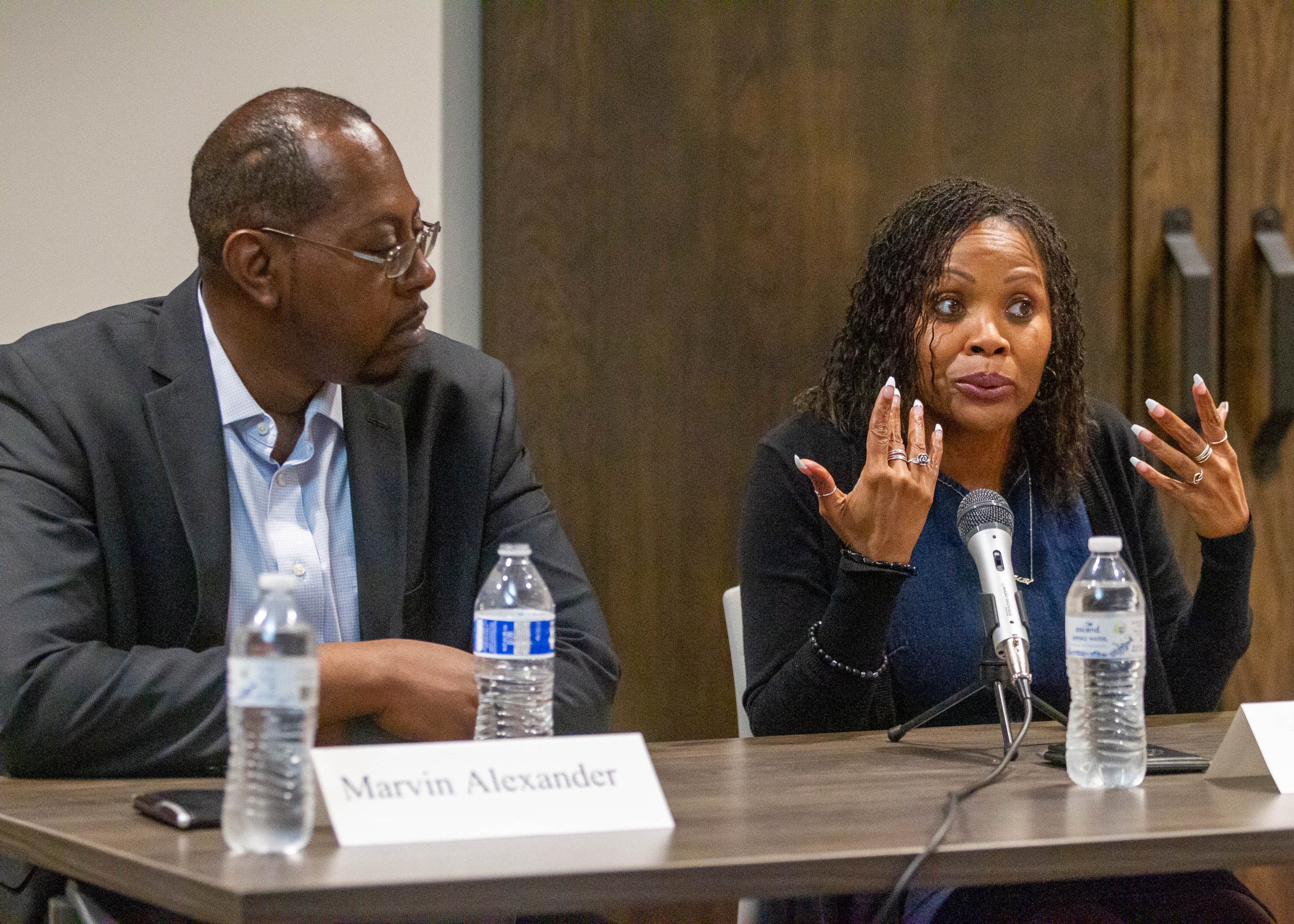 Keli Benford (right), sitting next to Marvin Alexander, talks during a roundtable conversation on the obstacles to voting at Smyrna Community Center on Sunday, July 18, 2021. (Photo: Steve Schaefer for The Atlanta Journal-Constitution)