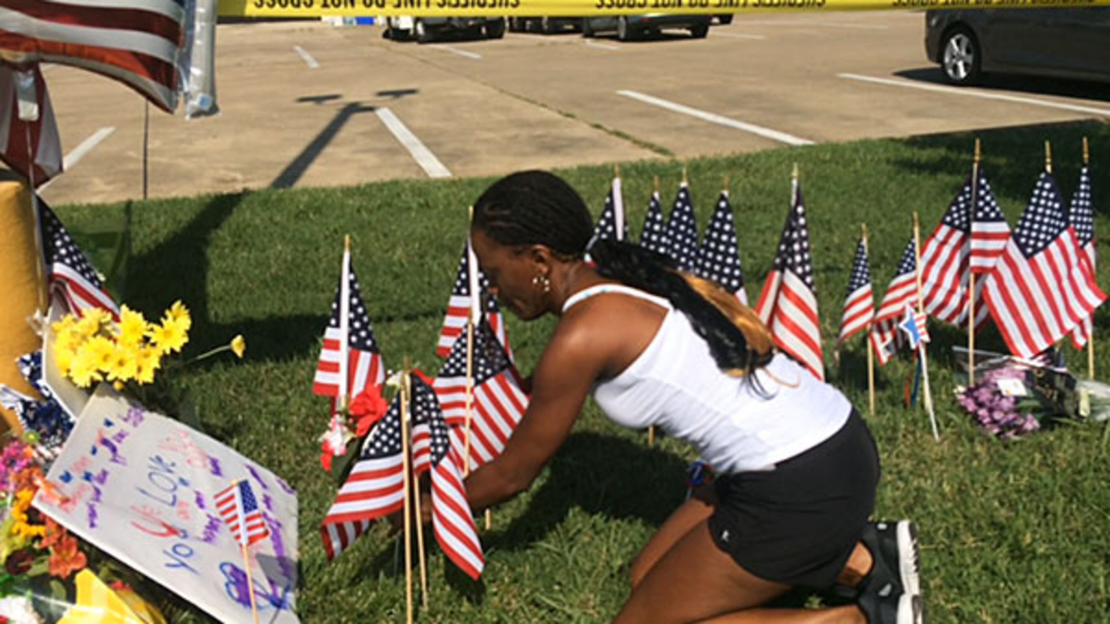 US Army veteran Diondra Pointer pays her respects. Photo: Jennifer Brett