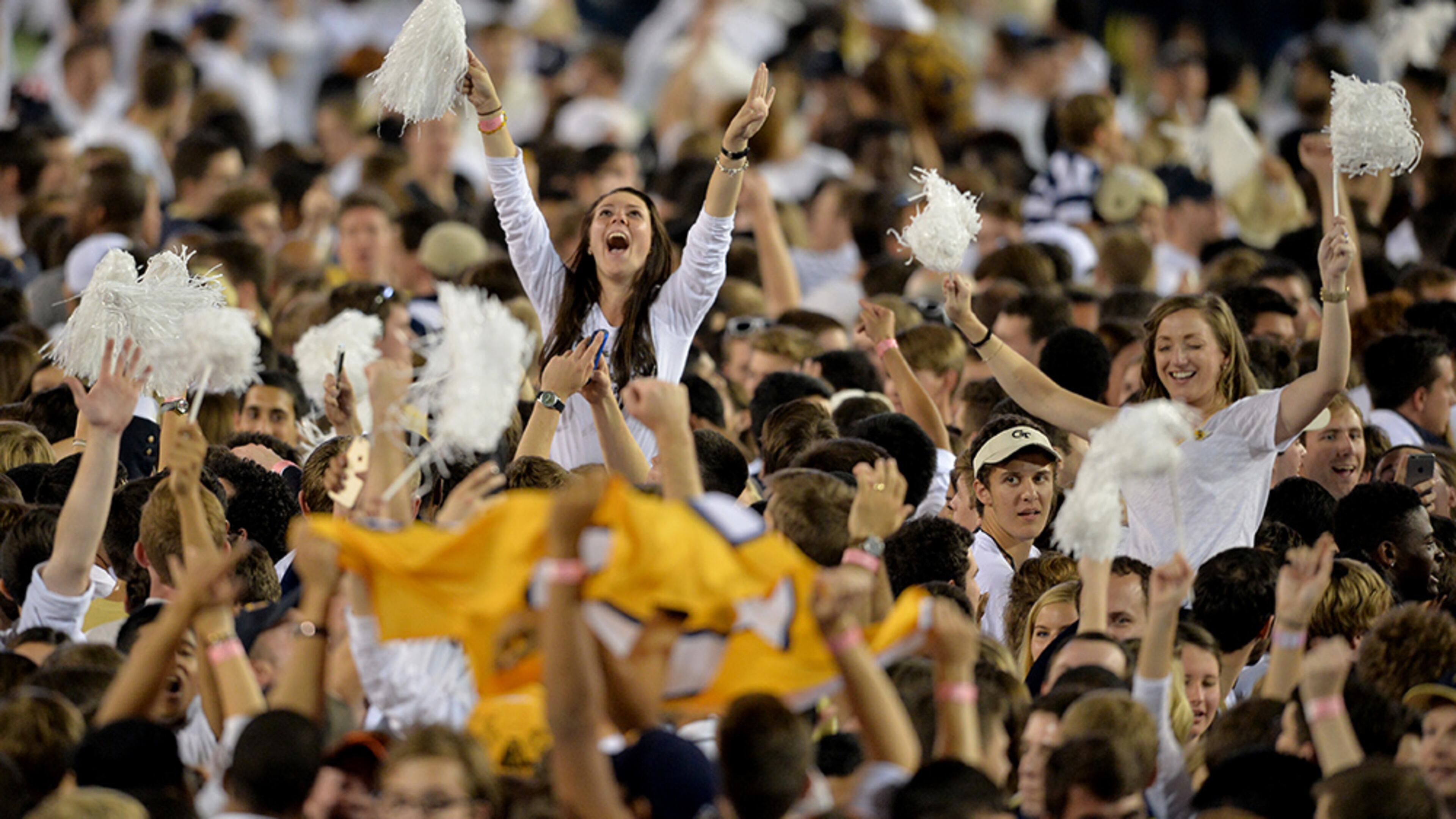 Georgia Tech Yellow Jackets celebrate after the upset the Florida State Seminoles Saturday. (Brant Sanderlin/AJC)