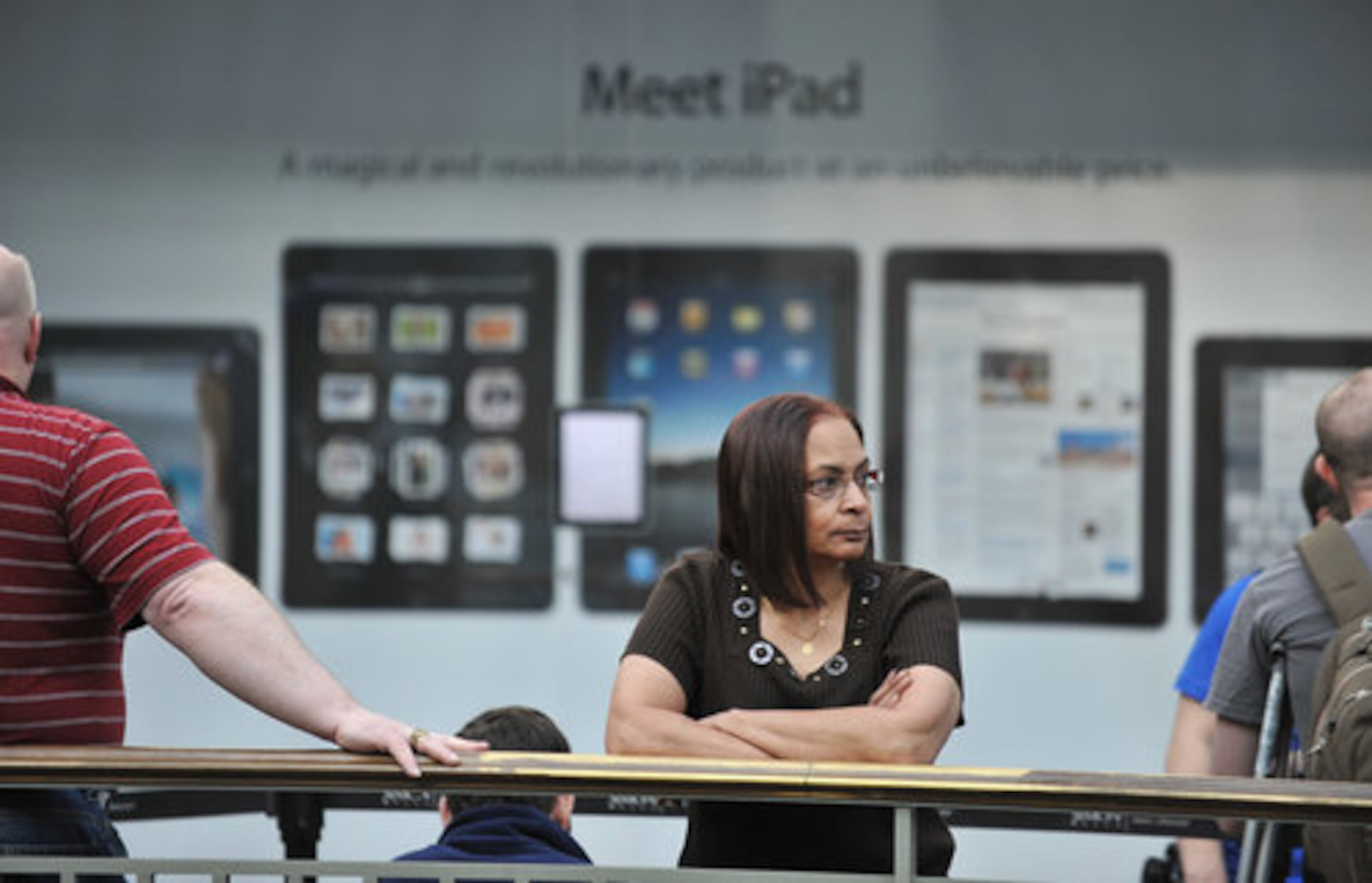 Betty Gibbs waits for the Apple Store in Lenox Square to open so she can buy an iPad. Fearing a shortage of the highly anticipated devices, Gibbs arrived at 5:30 a.m. to claim a spot near the front of the line. "I panicked and wanted to makes sure I got one" Gibbs said moments before the store opened at 9 a.m.