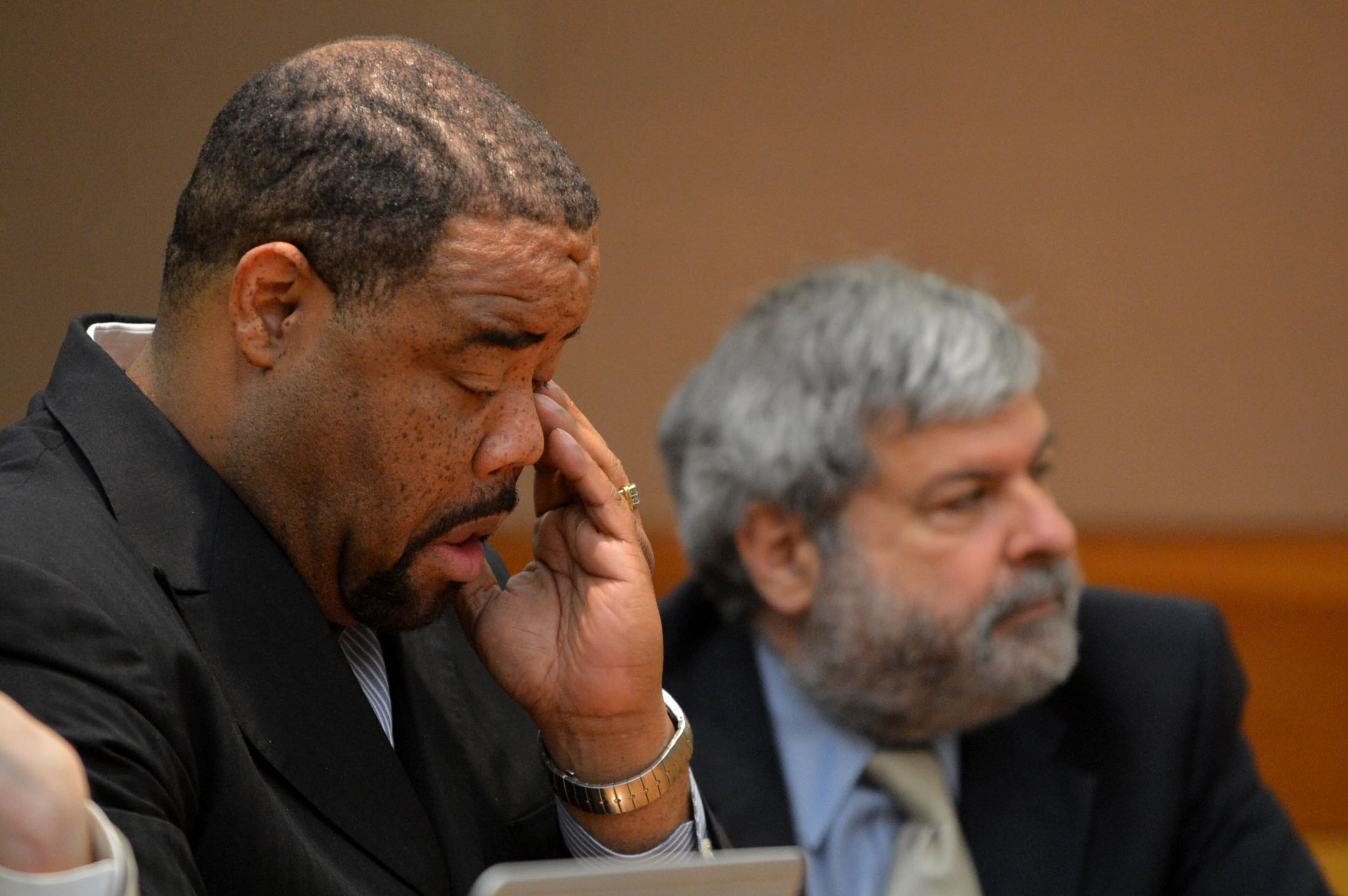Christopher Waller, the former principal of Parks Middle School, sits with his attorney, Don Samuel (right), before he pleaded guilty and agreed to cooperate with prosecutors. Waller avoided prison time as a first-time offender. Instead, he must pay $50,000 in fines and restitution, serve five years of probation, perform 1,000 hours of community service and apologize.Educators in the Atlanta Public Schools cheating scandal enter pleas before Judge Jerry Baxter in Fulton County Superior Court Friday, February 21, 2014. Any defendants in the widespread Atlanta Public Schools cheating case who don't make guilty pleas by the end of Friday will likely go on trial this spring, including Superintendent Beverly Hall and senior members of her staff. KENT D. JOHNSON / KDJOHNSON@AJC.COM