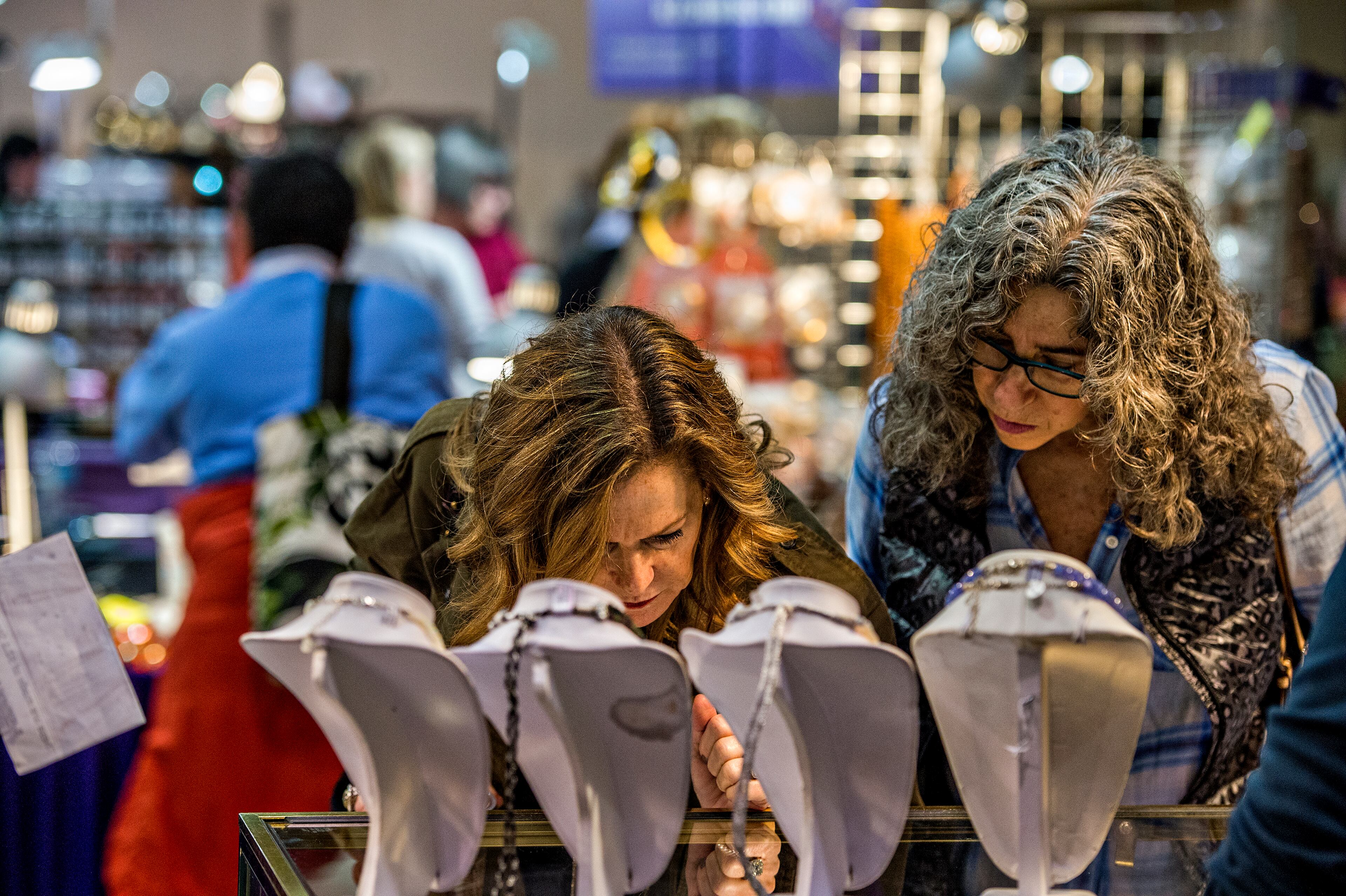 Vicky Taylor (left) and Maleah Taylor check out the different beads for sale during the Intergalactic Bead Show at the Infinite Energy Center in Duluth on Saturday, Feb. 6, 2016. JONATHAN PHILLIPS / SPECIAL