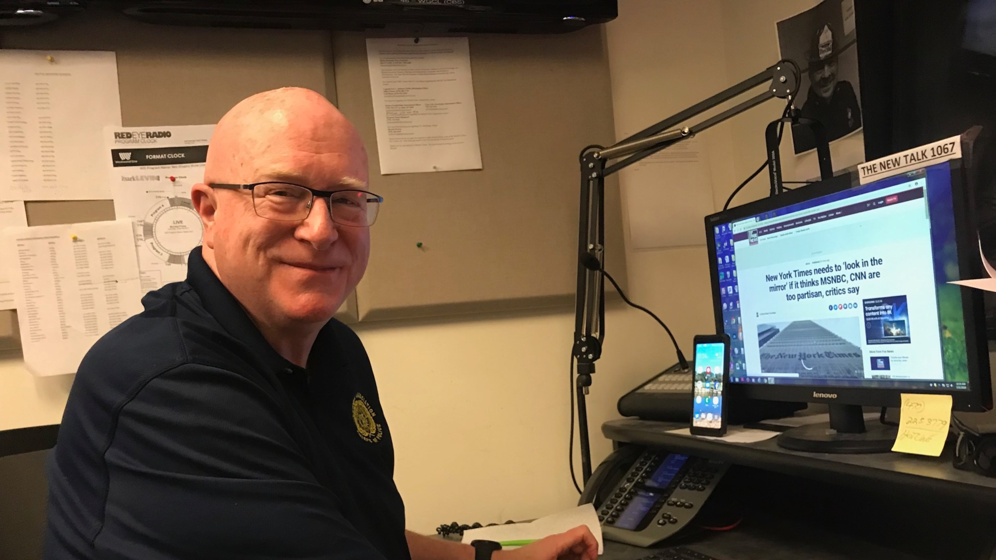 Mike Brooks preps for his final show on Talk 106.7.