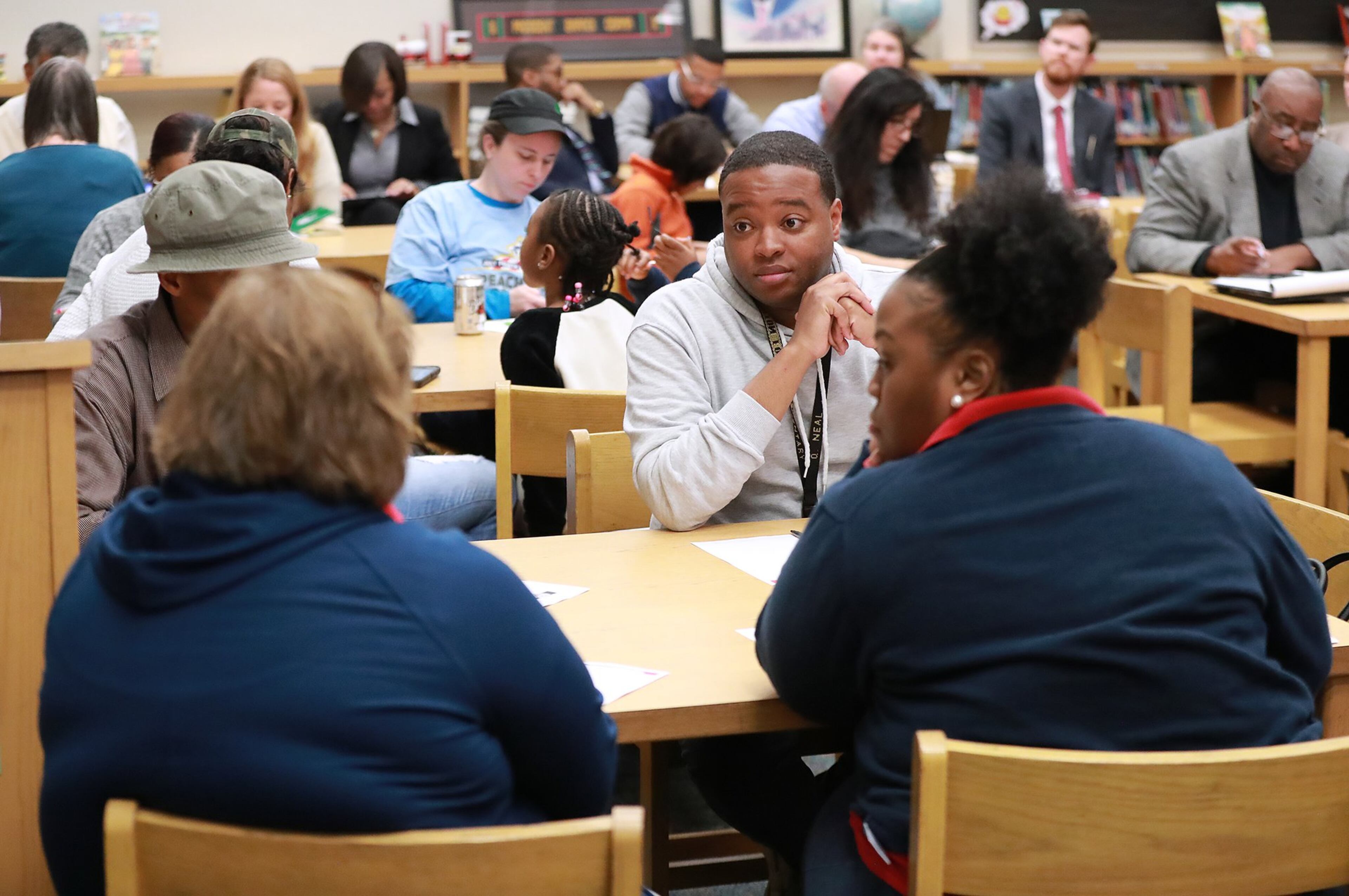 Parents and other attendees participate in round table discussion during the Atlanta Public Schools presentation on an improvement plan during a community meeting at Hope-Hill Elementary School on Monday, Feb. 25, 2019. Curtis Compton/ccompton@ajc.com