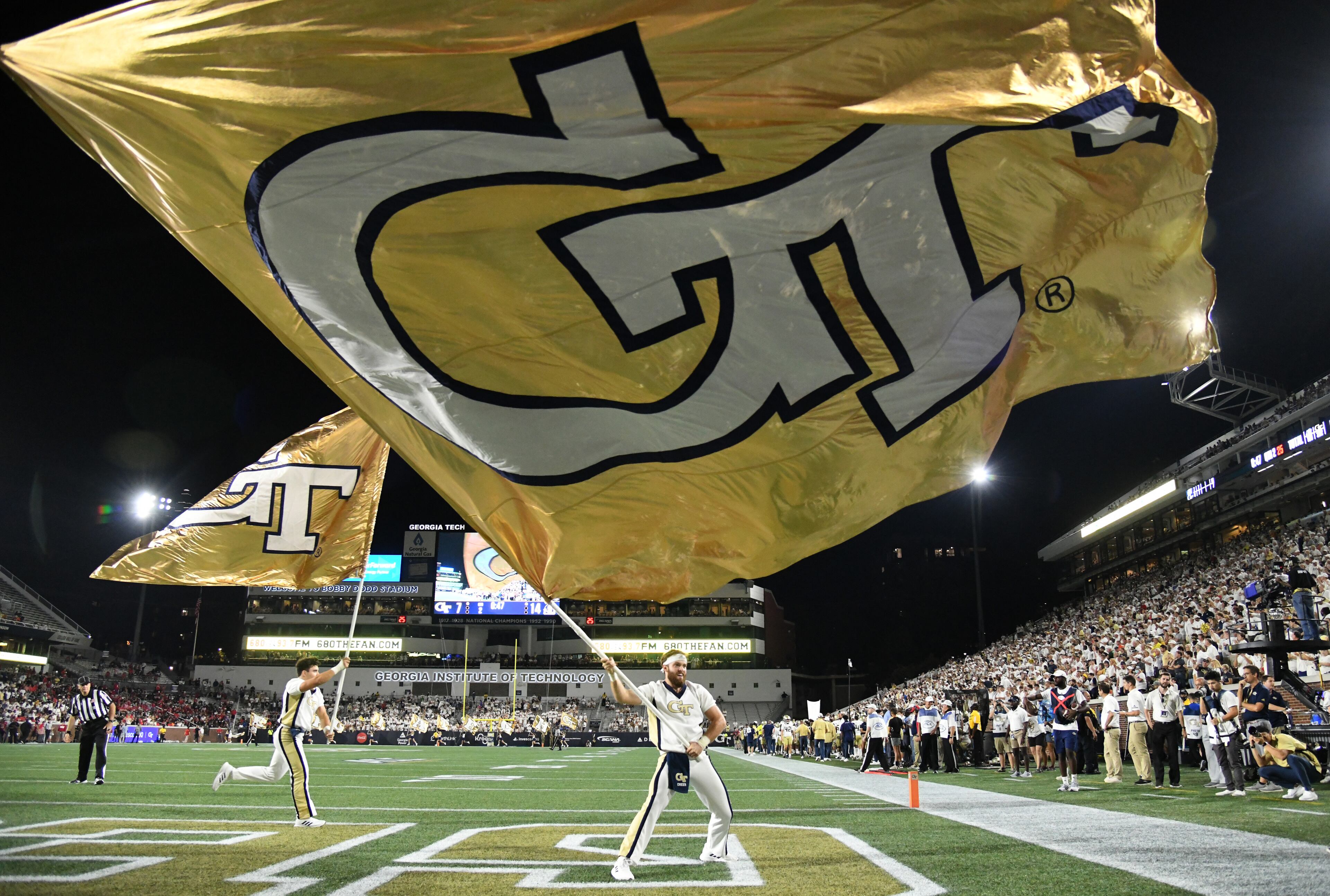September 4, 2021 Atlanta - Georgia Tech fans cheer after wide receiver Kyric McGowan (2) scored a touchdown during the first half of an NCAA college football game at Georgia Tech's Bobby Dodd Stadium in Atlanta on Saturday, September 4, 2021. (Hyosub Shin / Hyosub.Shin@ajc.com)
