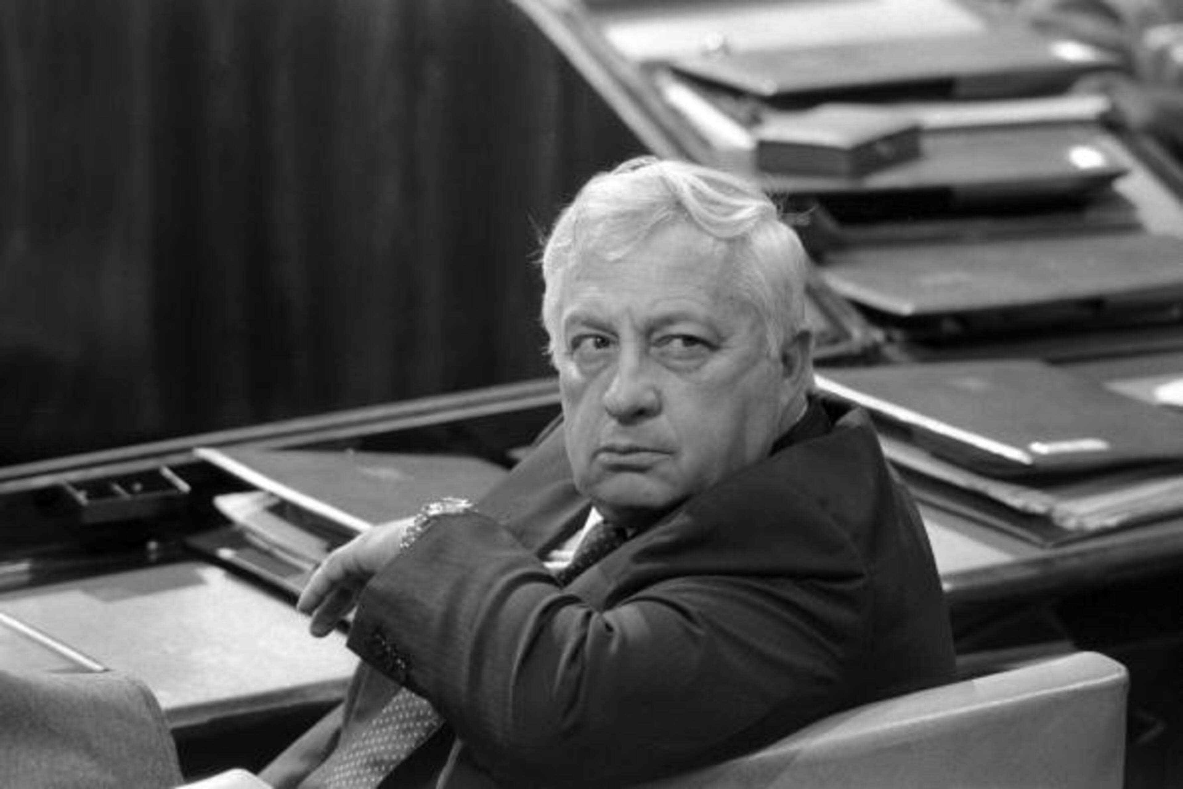 JERUSALEM, ISRAEL - MAY 6, 1985: (ISRAEL OUT) In this handout from the Israeli Governmental Press Office, Industry and Trade Minister Ariel Sharon sits in his chair in the Knesset, the Israeli parliament, May 6, 1985 in Jerusalem. (Photo by Nati Harnik/GPO via Getty Images)