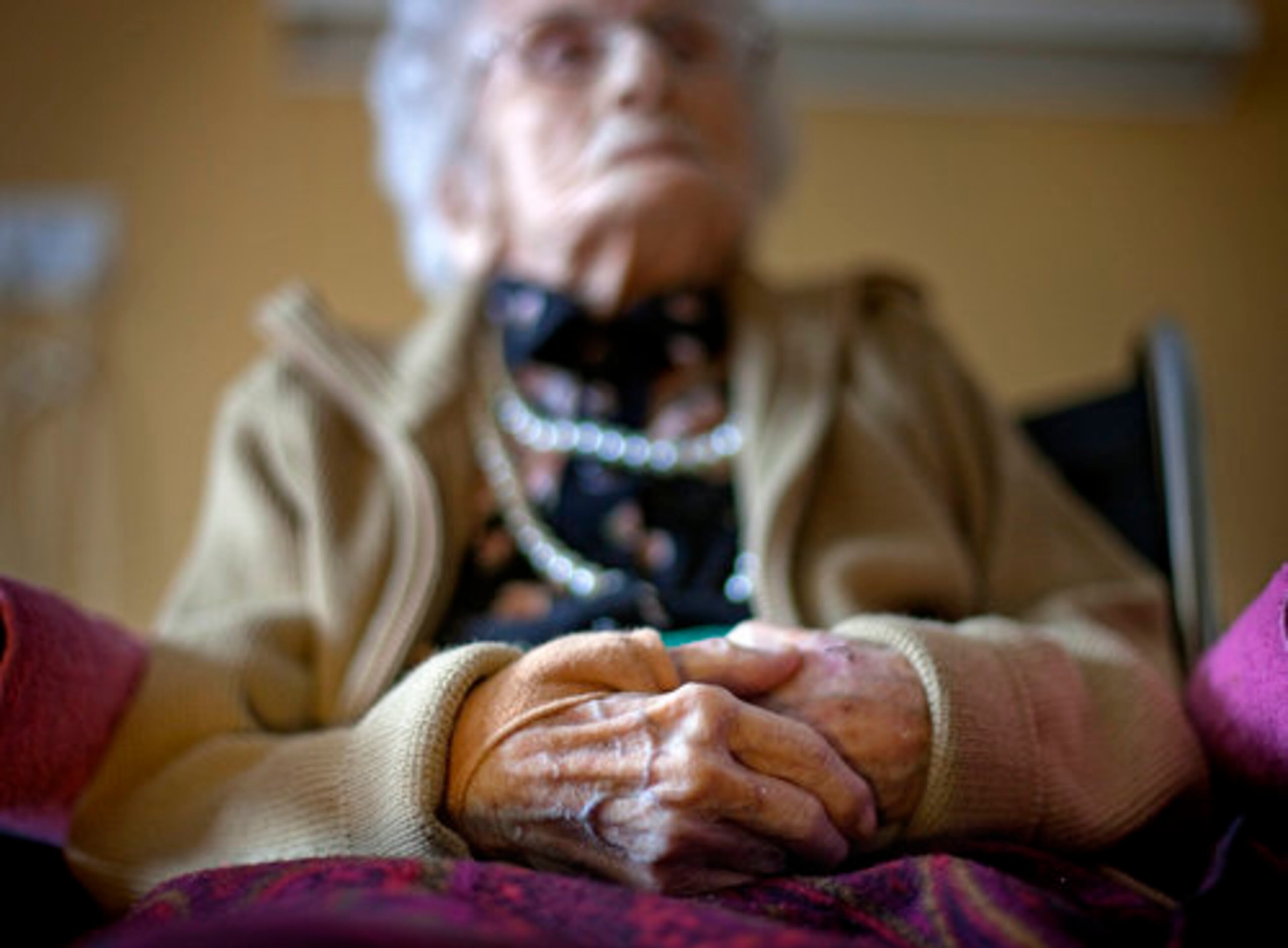Besse Cooper, who at 114 years and five months old, is the world's oldest person according to the Los Angeles-based Gerontology Research Group, sits in her room at a nursing home Tuesday, Feb. 1, 2011, in Monroe, Ga.