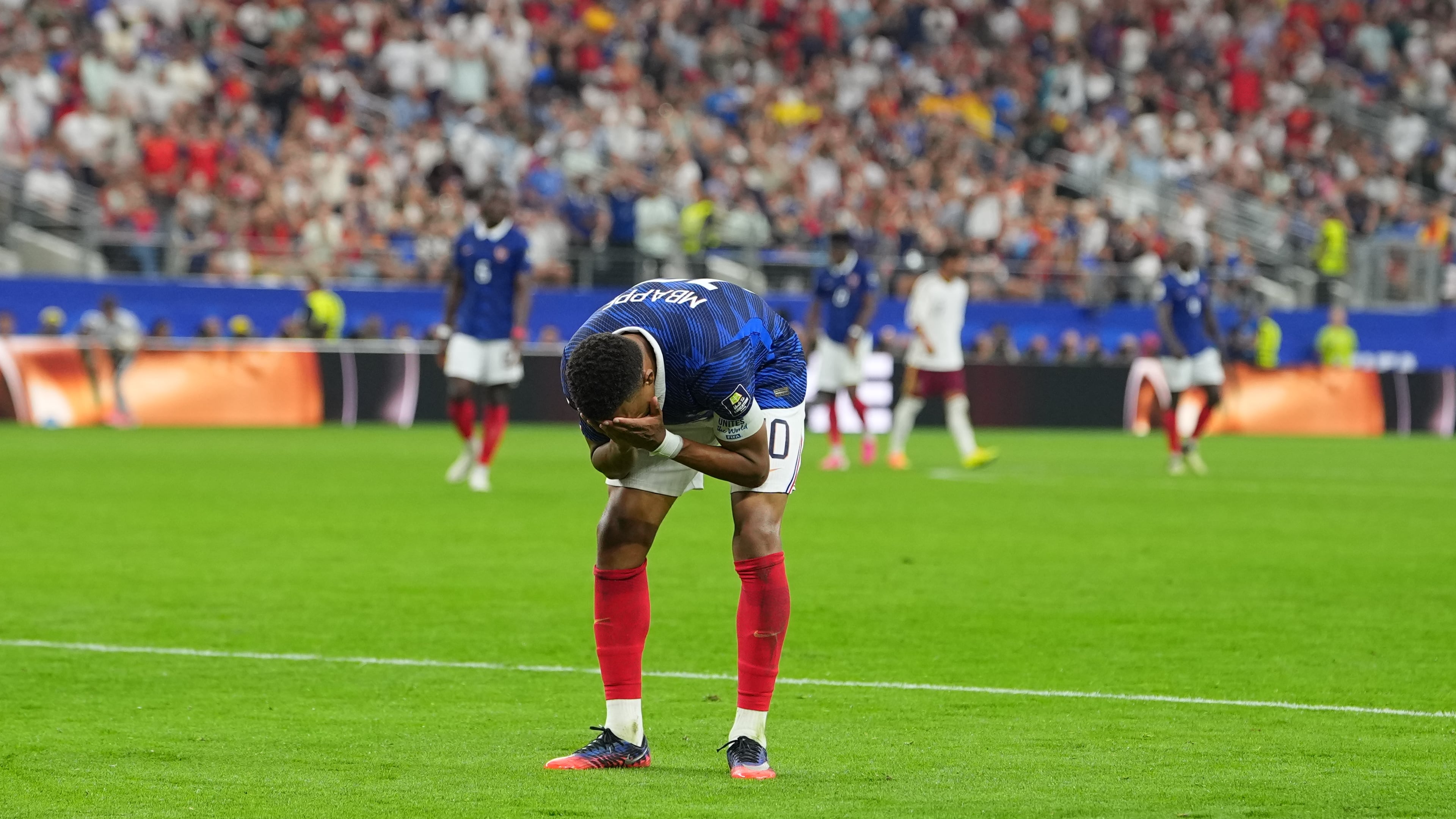 France's Kylian Mbappe reacts during a World Cup semifinal soccer match against Spain in Arlington, Texas, near Dallas, Tuesday, July 14, 2026. (AP Photo/Julio Cortez)