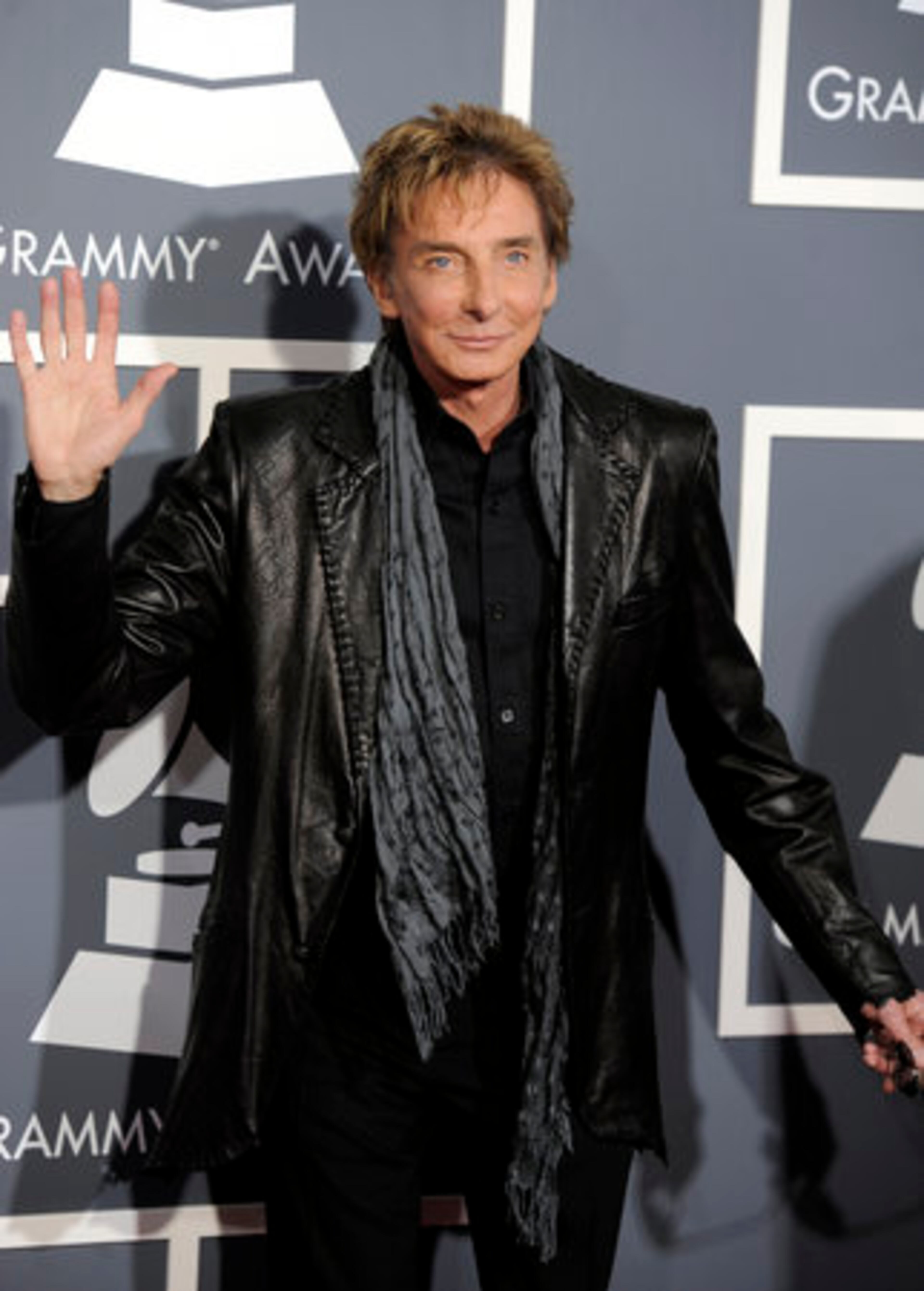 Barry Manilow arrives at the 53rd annual Grammy Awards on Sunday, Feb. 13, 2011, in Los Angeles.