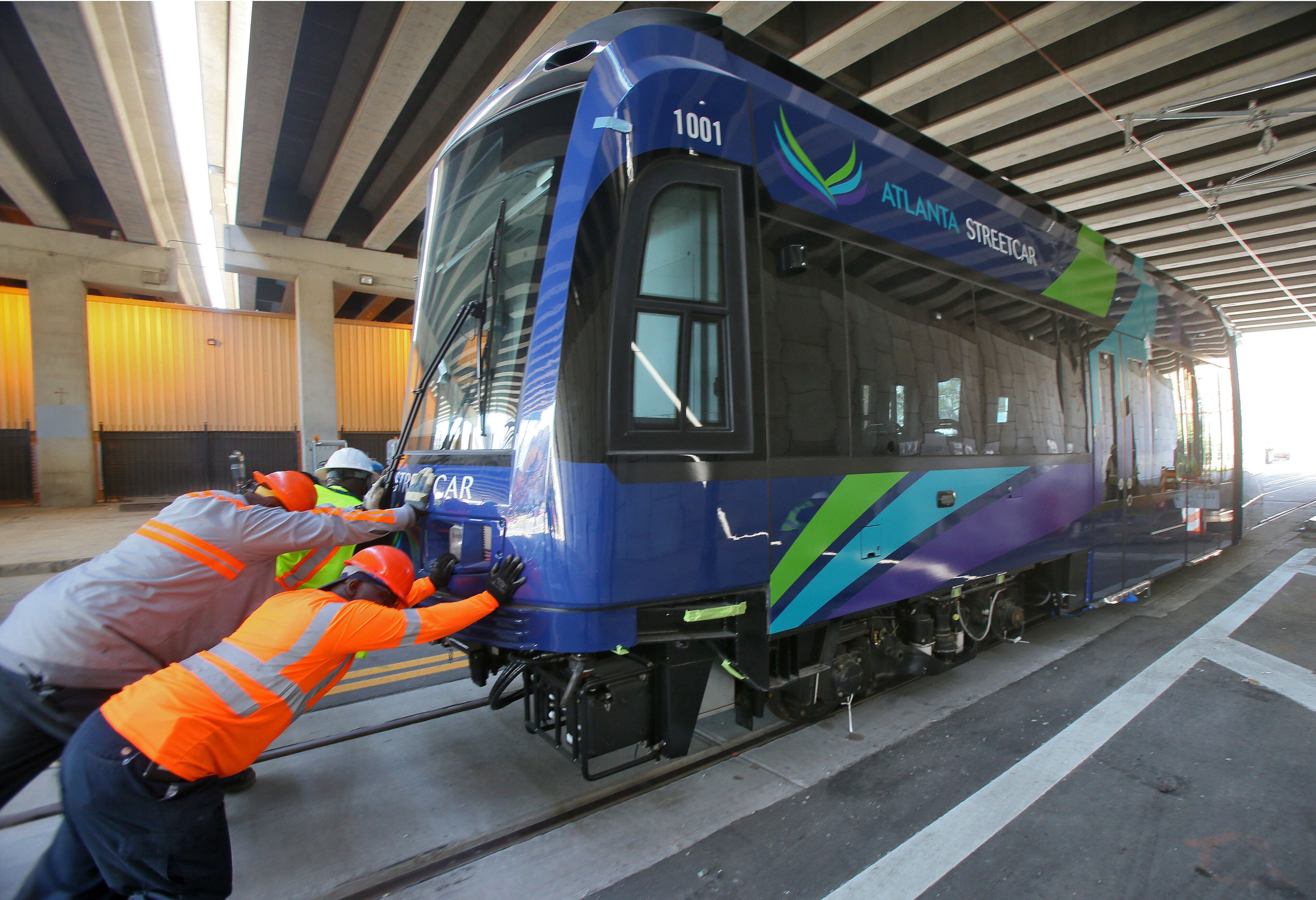 Once the streetcar was on level ground all it took was manpower to push it along the tracks.