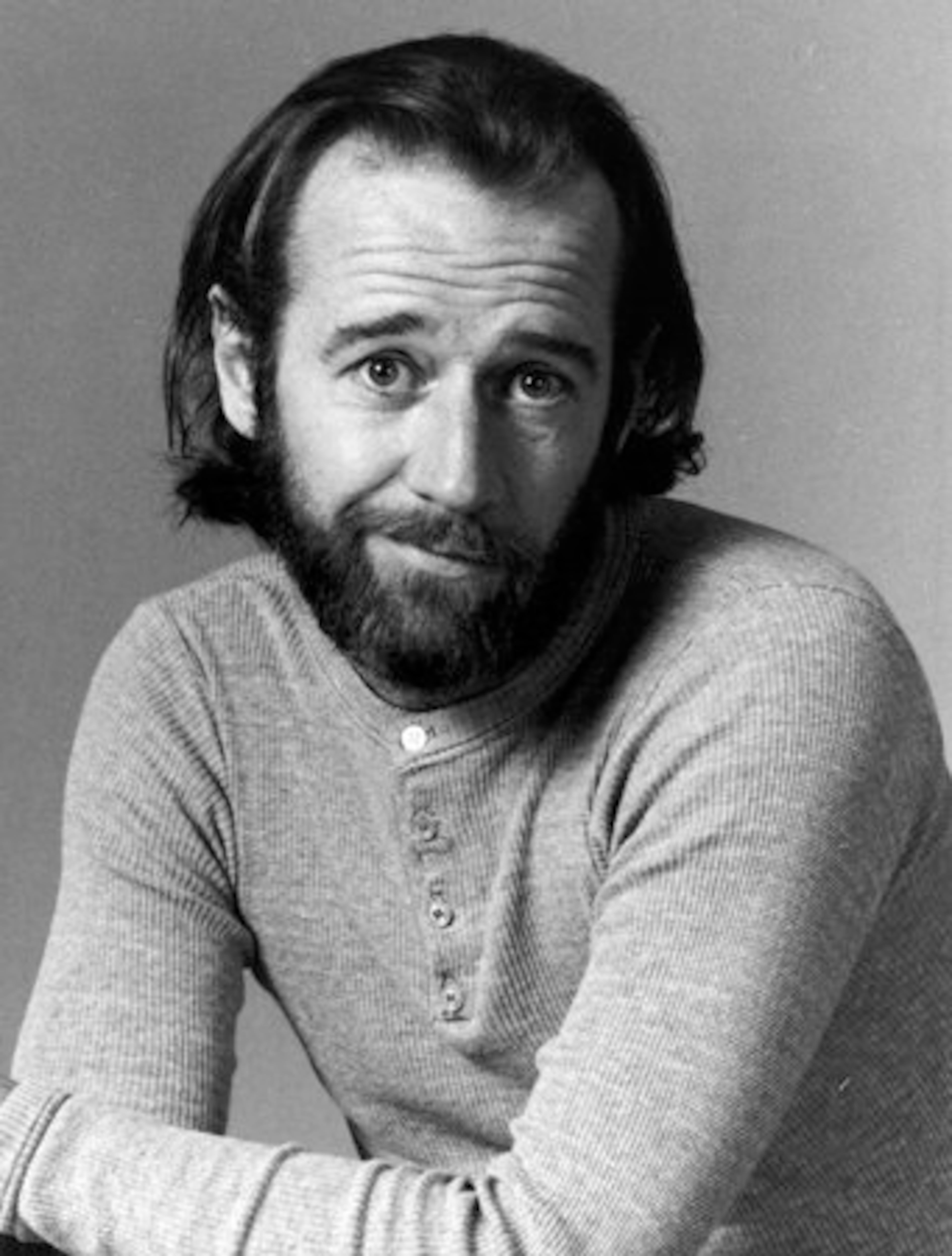 Carlin's staunch defense of free speech in his most famous routine, 'Seven Words You Can Never Say On Television,' led to a key Supreme Court ruling on obscenity. Shown here in a promotional photo for 'Saturday Night Live,' Carlin served as host for the debut of the show in 1975.