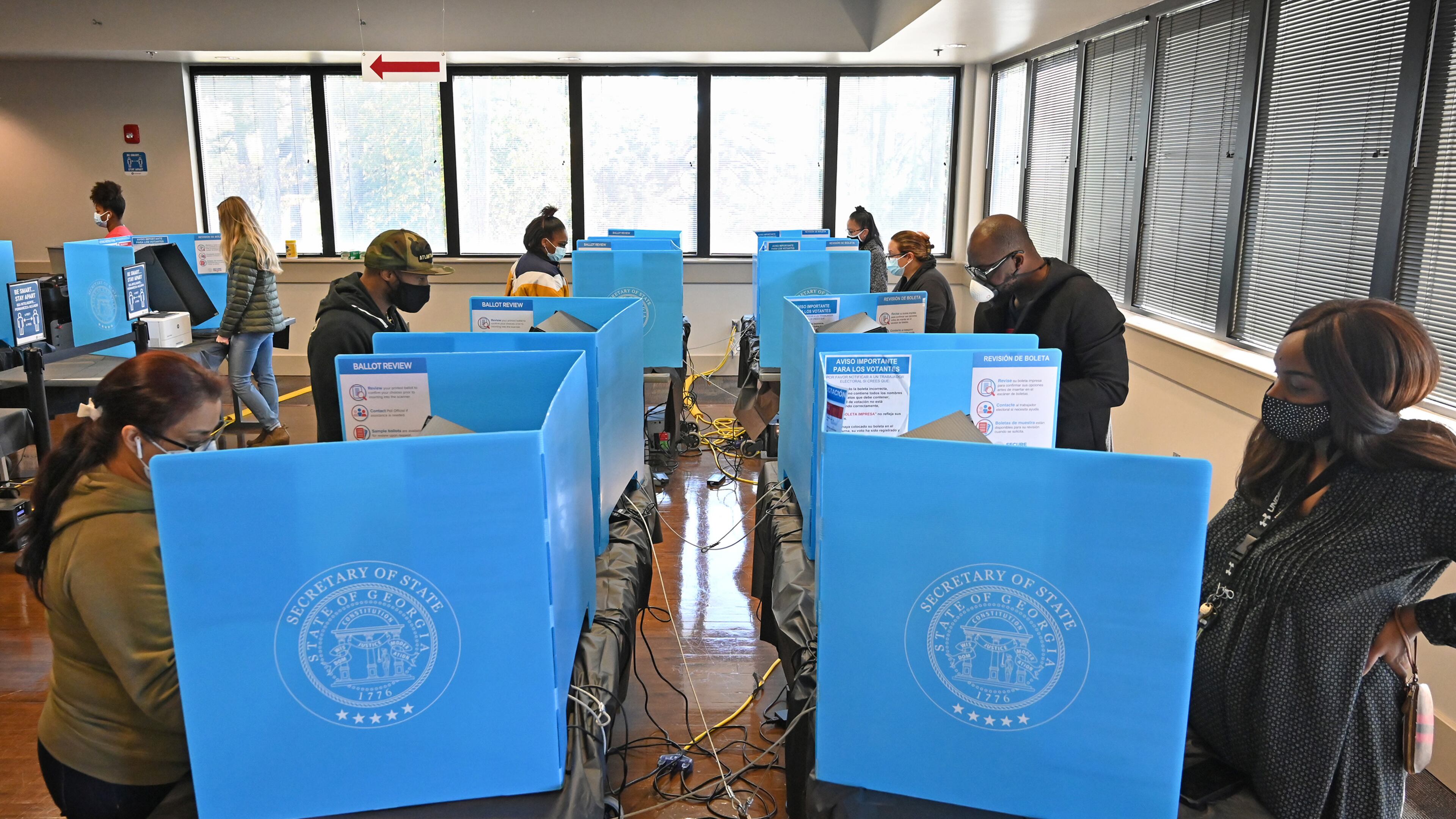 Gwinnett County voters cast their early voting ballots at the Shorty Howell Park Activity Building in Duluth, Georgia on the last day of early voting on Friday, Oct. 30, 2020. (Hyosub Shin/Atlanta Journal-Constitution/TNS)