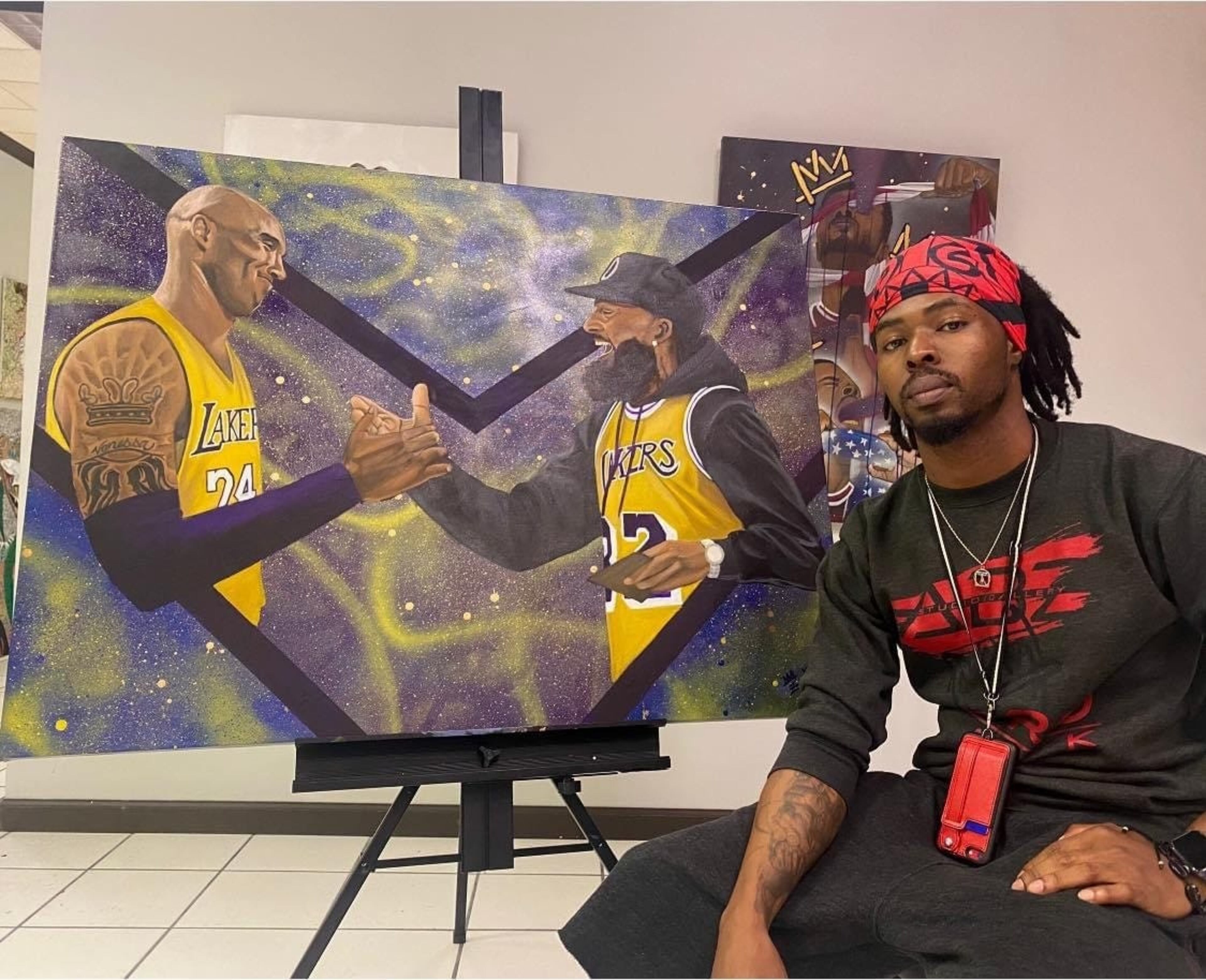 Xavier "Zay" Hutchins with his piece "Marathon Mentality." Photo courtesy of the artist