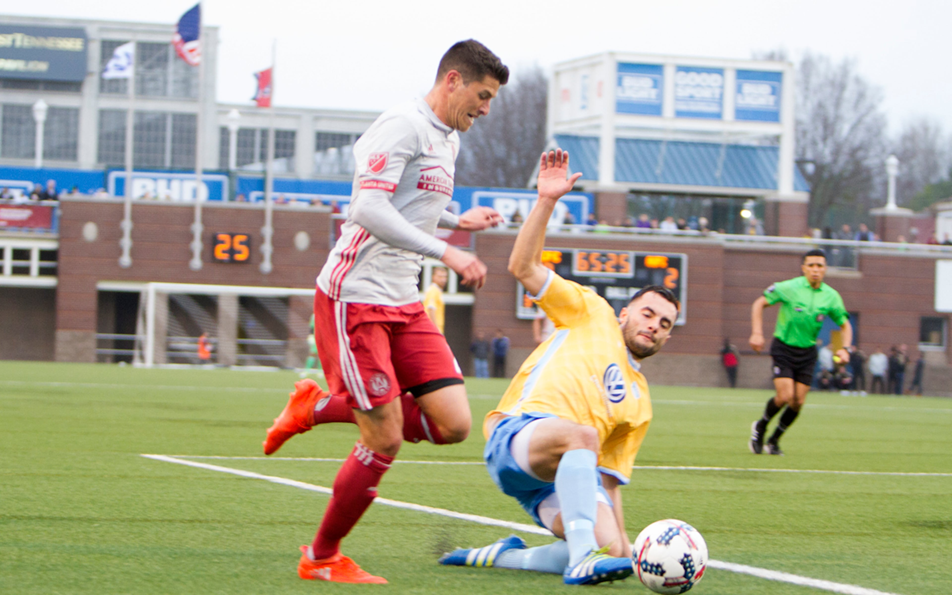 FEBRUARY 11, 2017 CHATTANOOGA TN Atlanta United defender Mark Bloom dribbles a Chattanooga defender during he first pre-season match.