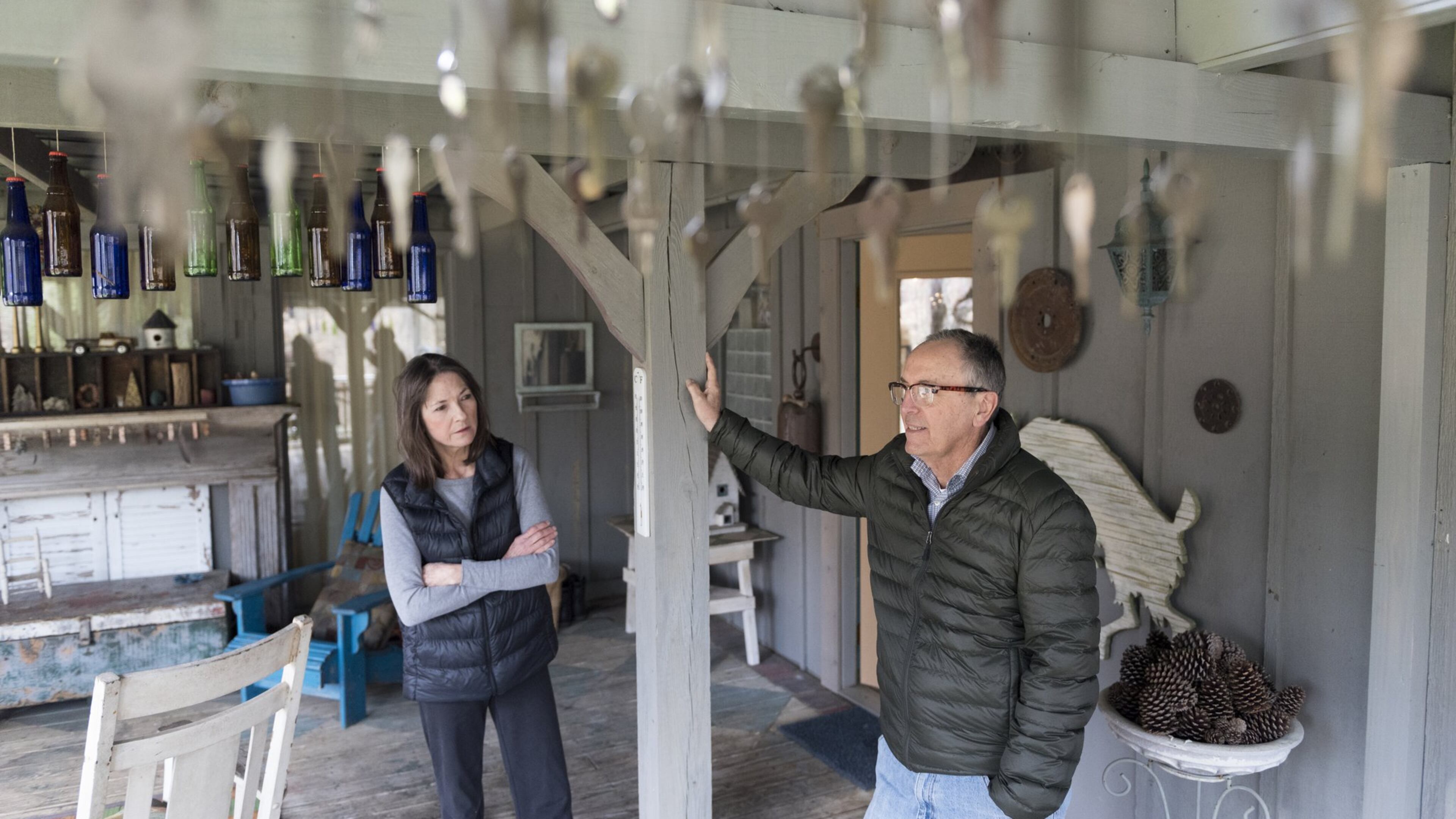 March 10, 2017, Tunnel Hill - Joel Blevins, right, and his wife Katie Blevins, stand on their front porch in Tunnel Hill, Georgia, on Friday, March 10, 2017. After not having health insurance for 3 years, the Blevins were able to be insured under the Affordable Care Act. The current administration is working towards repealing and replacing the law, which would greatly impact them. “It’s terrifying not to have insurance,” says Katie. “In our community I meet people that just don’t have any insurance…I worry about them. I worry about their kids and their family members,” says Joel. Katie works as a freelance artist and Joel works as a carpenter, and they rely on the ACA subsidy to be able to afford health insurance. “If we were to lose the subsidy, we’re looking at losing our health insurance,” says Joel. (DAVID BARNES / SPECIAL)