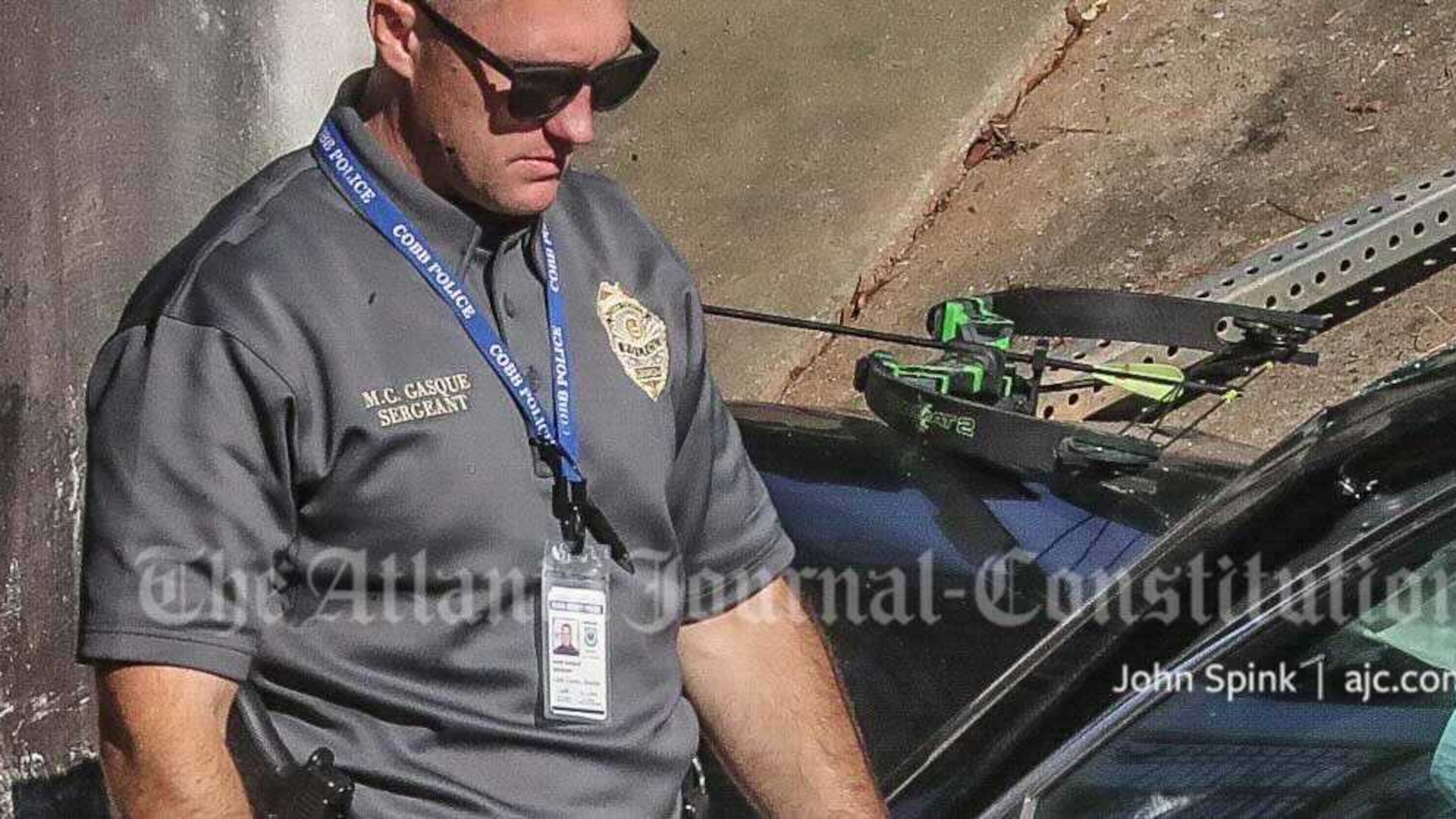 The man was shot by police after pointing a bow and arrow at officers, officials said.