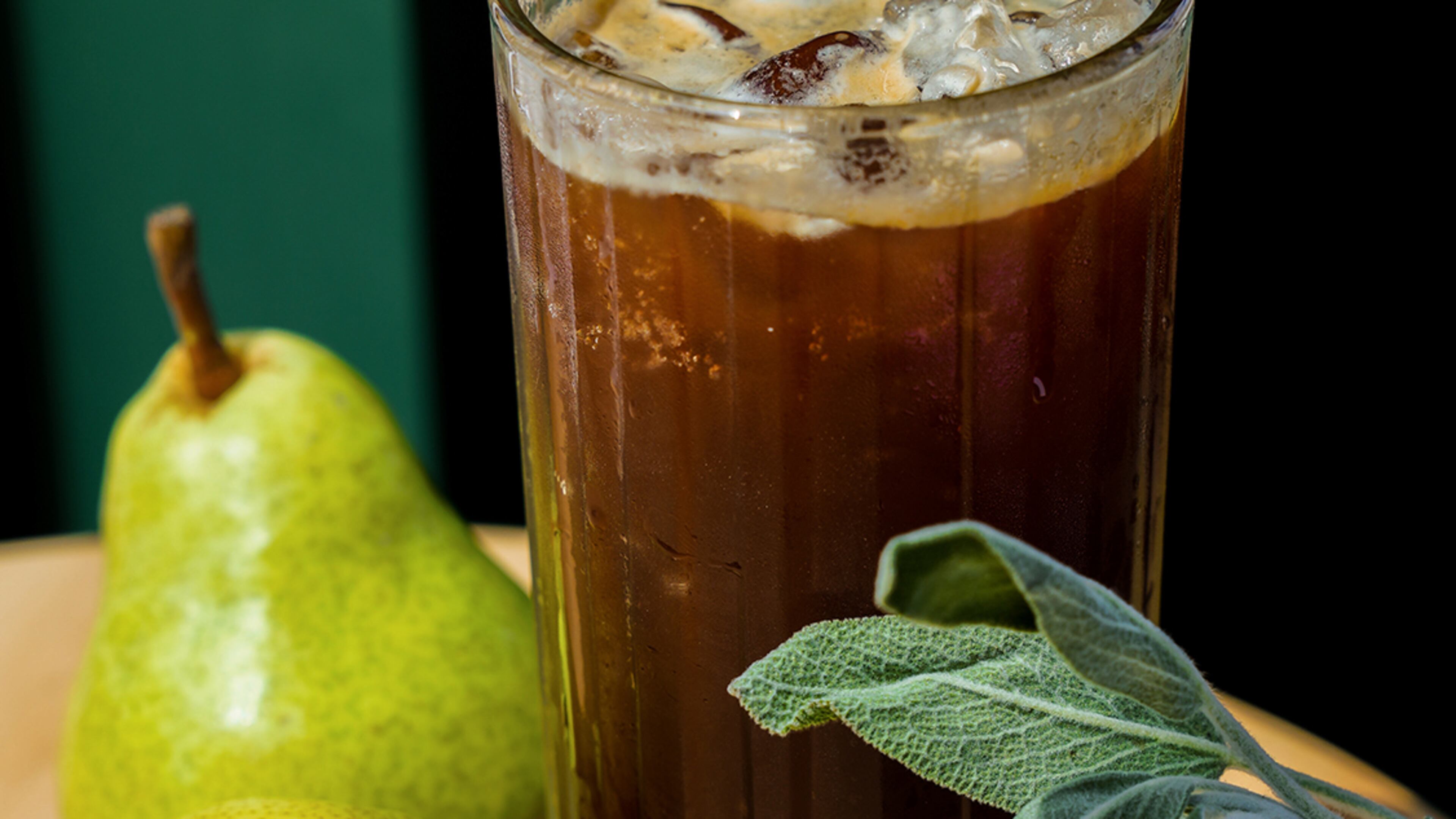 Spiller Park's pear sage espresso tonic, also known as PSWLU (Pear Sage We Love You), includes pear puree, sage syrup, lemon, seltzer water and espresso. Courtesy of Gloria McDuff/Spiller Park