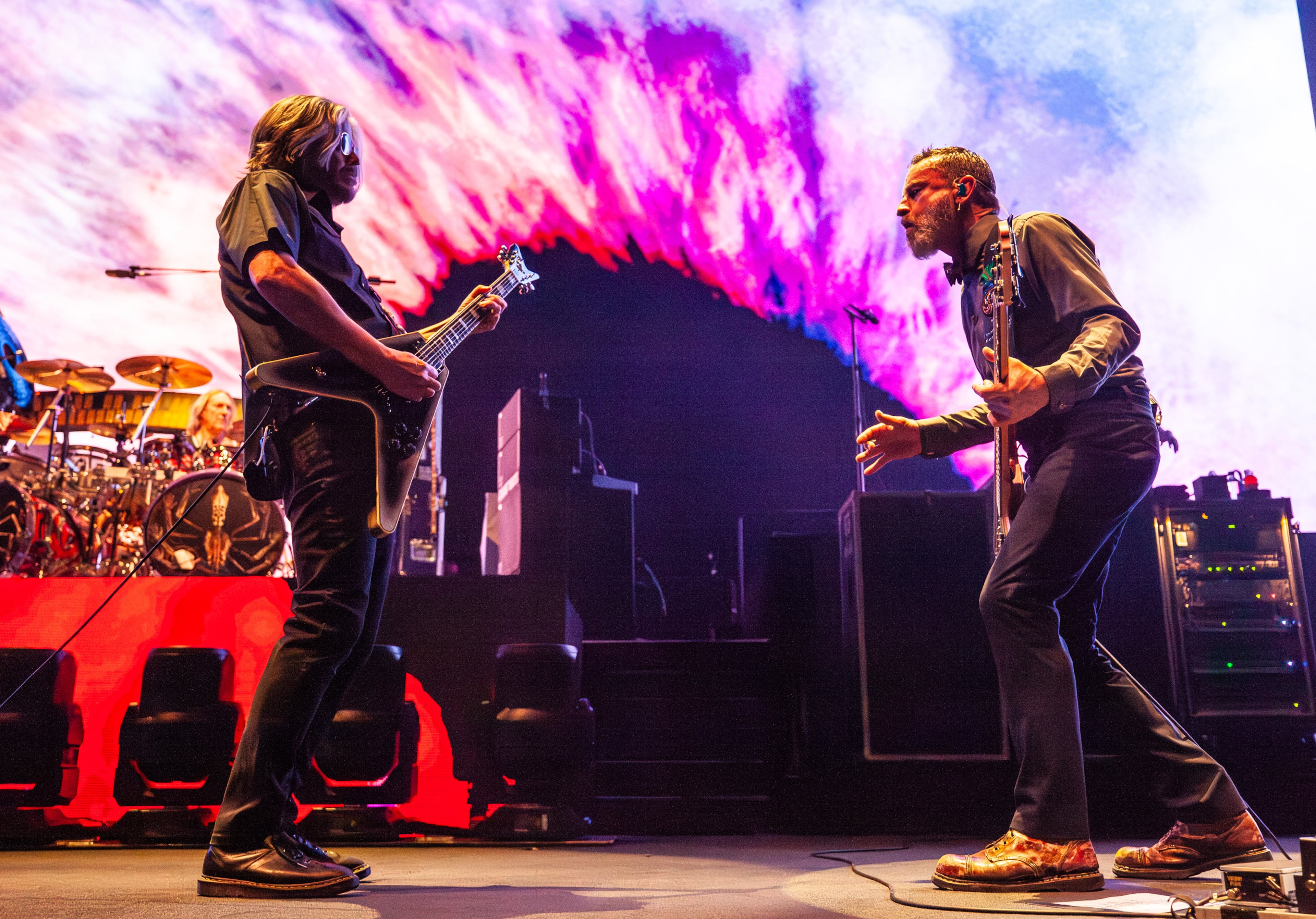 Adam Jones and Justin Chancellor vibe with each other as Tool plays to a sold out crowd at State Farm Arena. Photo taken Tuesday January 24, 2024 at State Farm Arena. (Ryan Fleisher for The Atlanta Journal-Constitution)