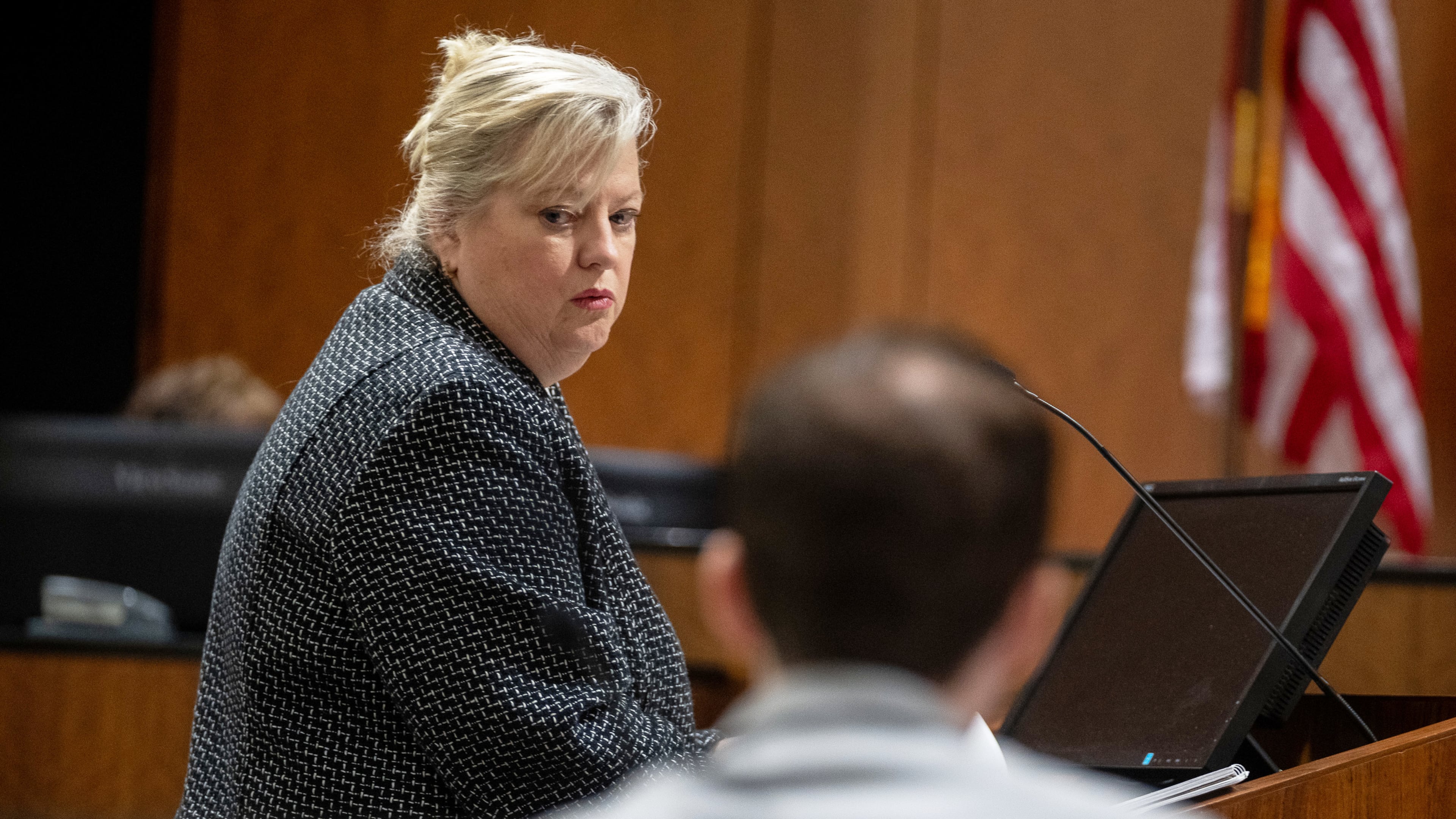 Defense attorney Kathryn Nester looks back past Tyler Robinson, who is accused of fatally shooting Charlie Kirk, during a preliminary hearing in 4th District Court, in Provo, Utah, Tuesday, July 7, 2026. (Trent Nelson/The Salt Lake Tribune via AP, Pool)