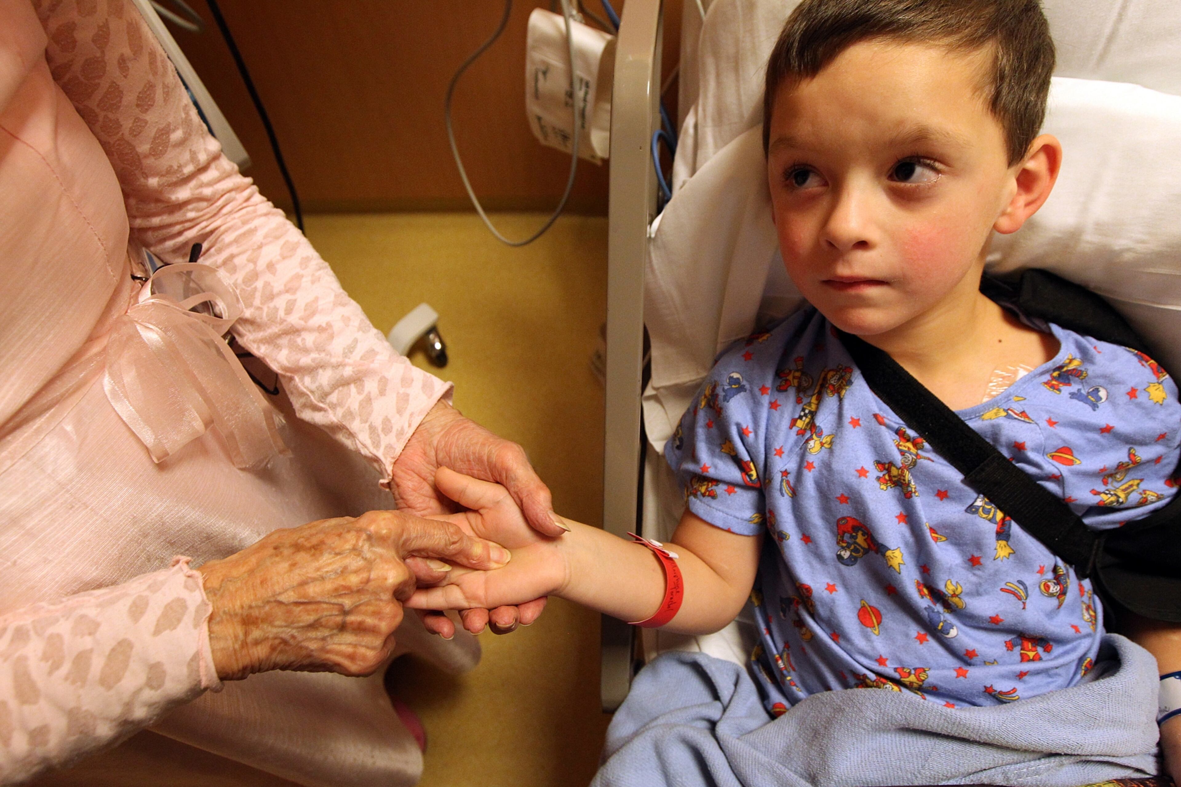 Noah Carlile, 6, of Braselton, receives a spot of fairy dust from Viener. Upon the dust is carried one wish that can be given, not granted. There is a distinct difference, she says.