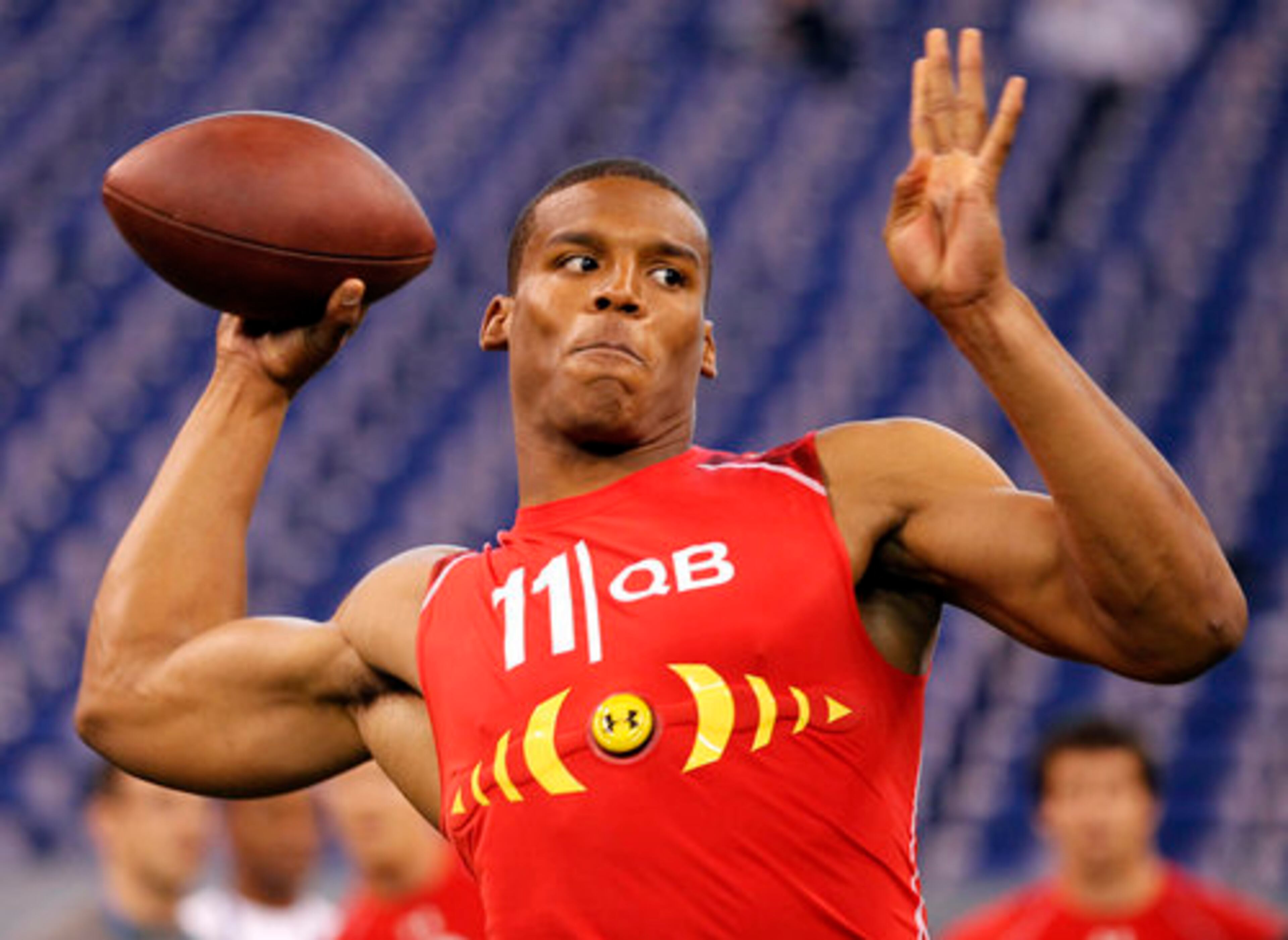Auburn quarterback and Heisman trophy winner Cam Newton struggled in passing drills, connecting on 11 of 21 attempts. Newton ran a 4.59 40-yard dash, and his vertical leap was 35 inches.