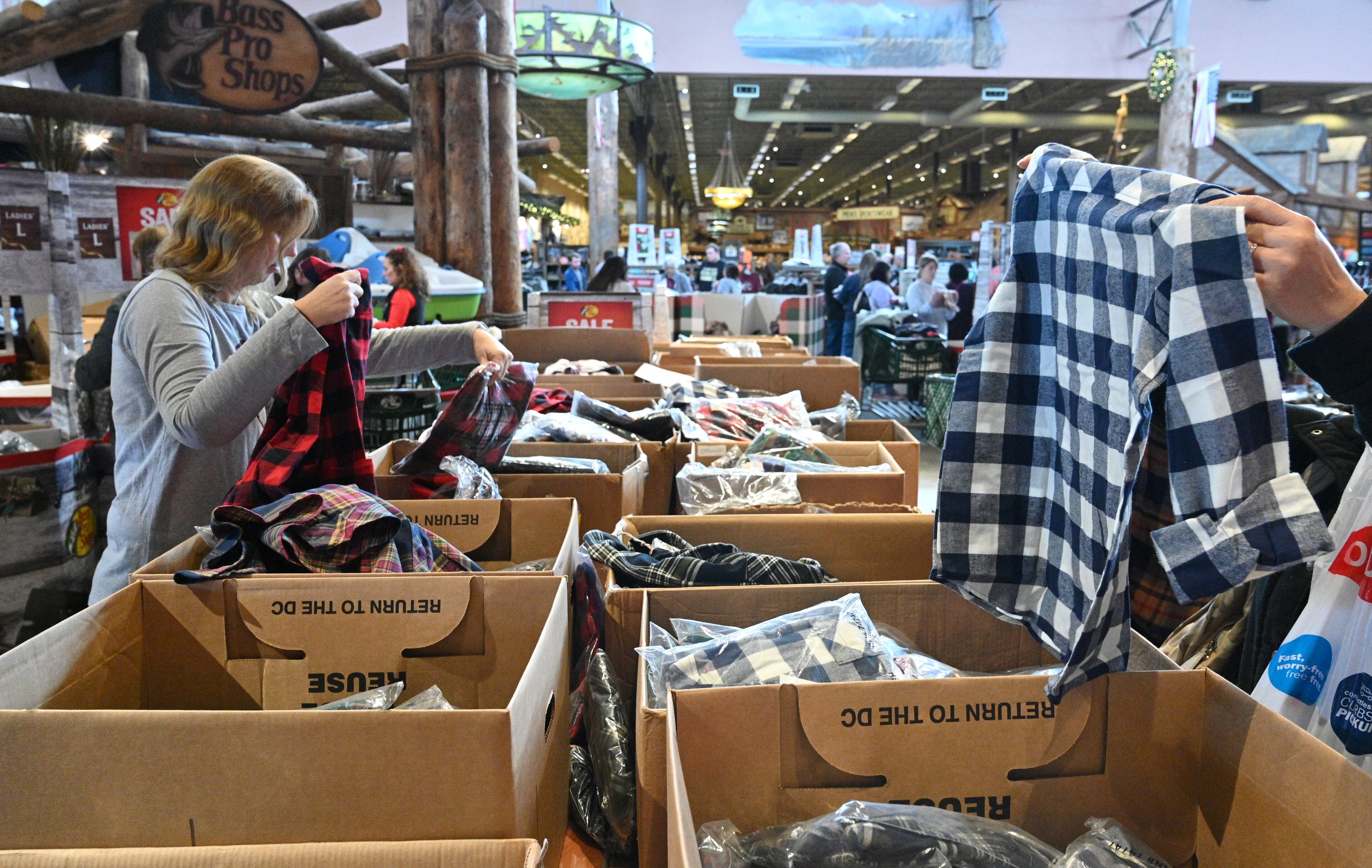 This 2022 file photo shows Black Friday shoppers at the Bass Pro Shops at Sugarloaf Mills in Lawrenceville.