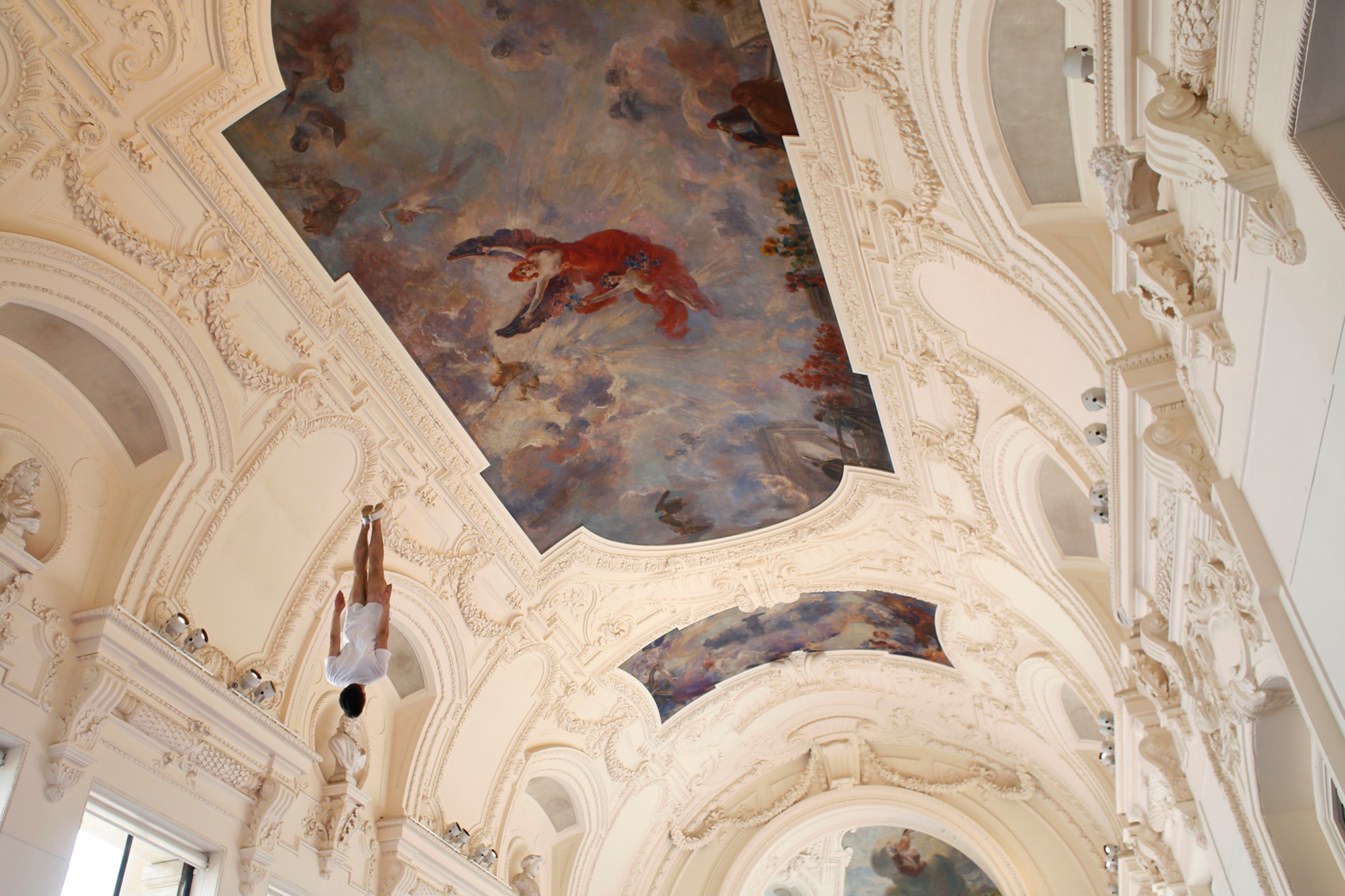French trampolinist Allan Morante performs at the Petit Palais museum in Paris, Friday, June 23, 2017. Paris is aiming to boost its bid for the 2024 Olympics by turning some of its world-famous landmarks over to sports for two days, with 100-meter races on a track floating on the Seine, high-diving into the river, cycling around the Arc de Triomphe and other events to showcase the French capital's suitability for the games. (AP Photo/Thibault Camus)