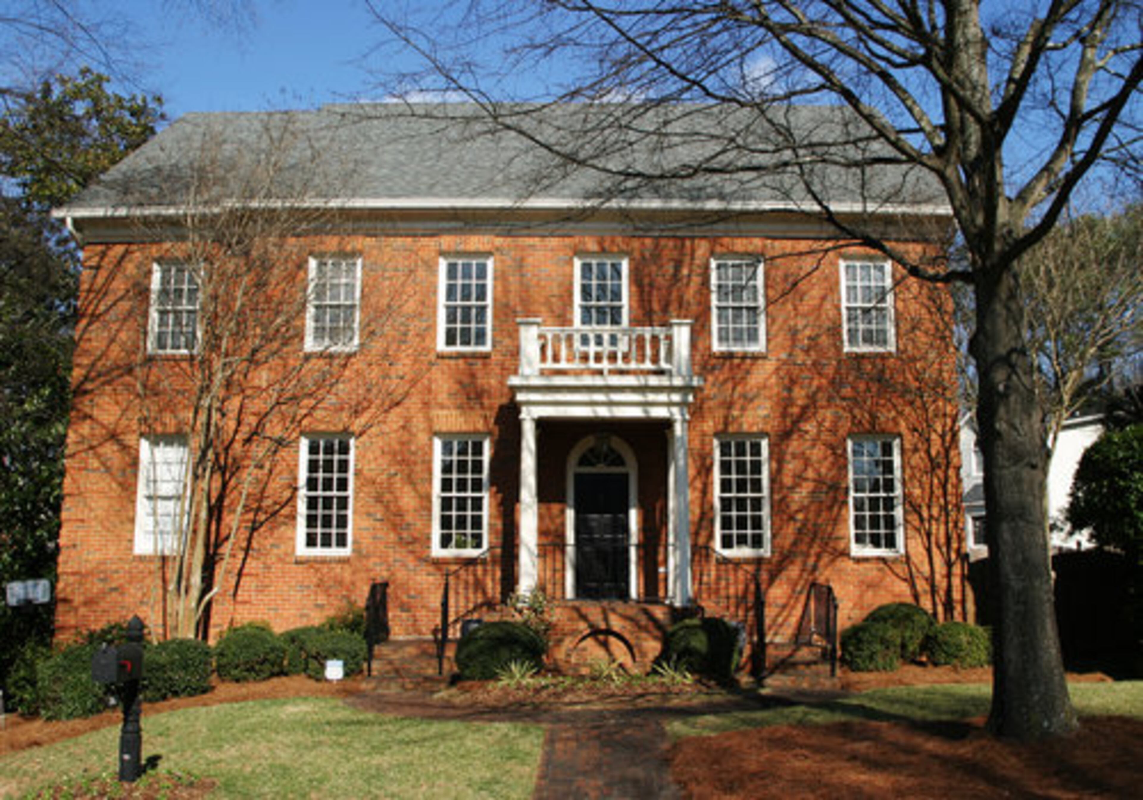 The 3,500-square-foot Georgian-style brick home has five bedrooms and three-and-a-half baths.
