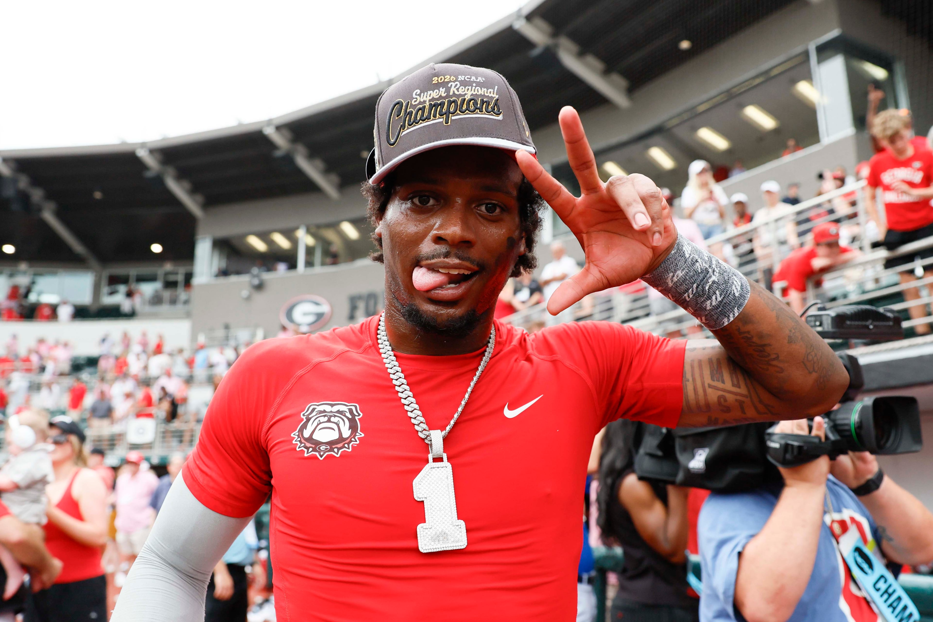 Georgia Bulldogs infielder Tre Phelps (1) reacts as he celebrates after winning the NCAA Super Regional series by defeating the Mississippi State Bulldogs 11-9 in extra innings at Foley Field on Sunday, June 7, 2026, in Athens. Miguel Martinez/AJC)