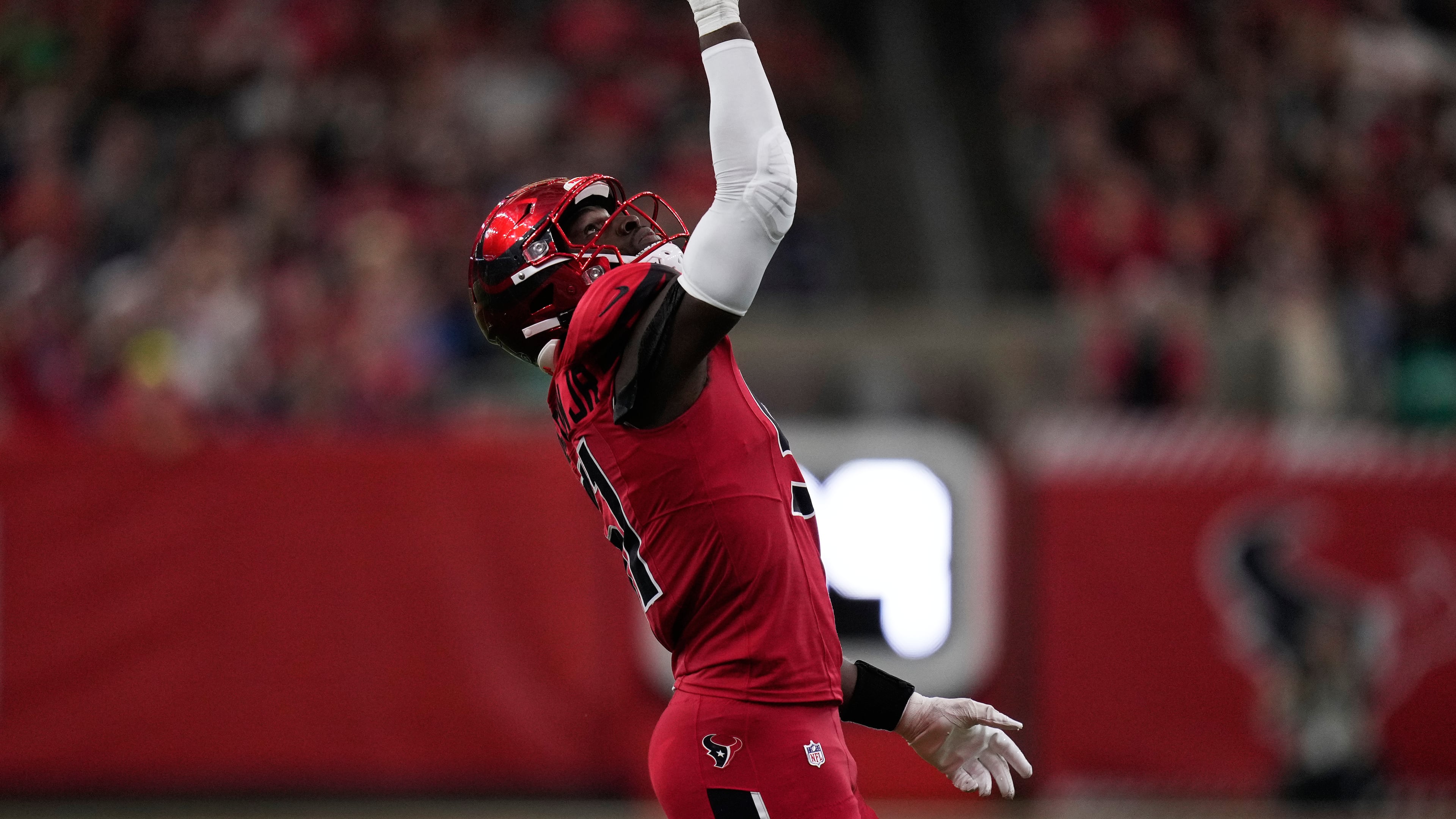 Houston Texans defensive end Will Anderson Jr. celebrates after sacking Las Vegas Raiders quarterback Geno Smith during the first half of an NFL football game Sunday, Dec. 21, 2025, in Houston. (AP Photo/Eric Christian Smith)