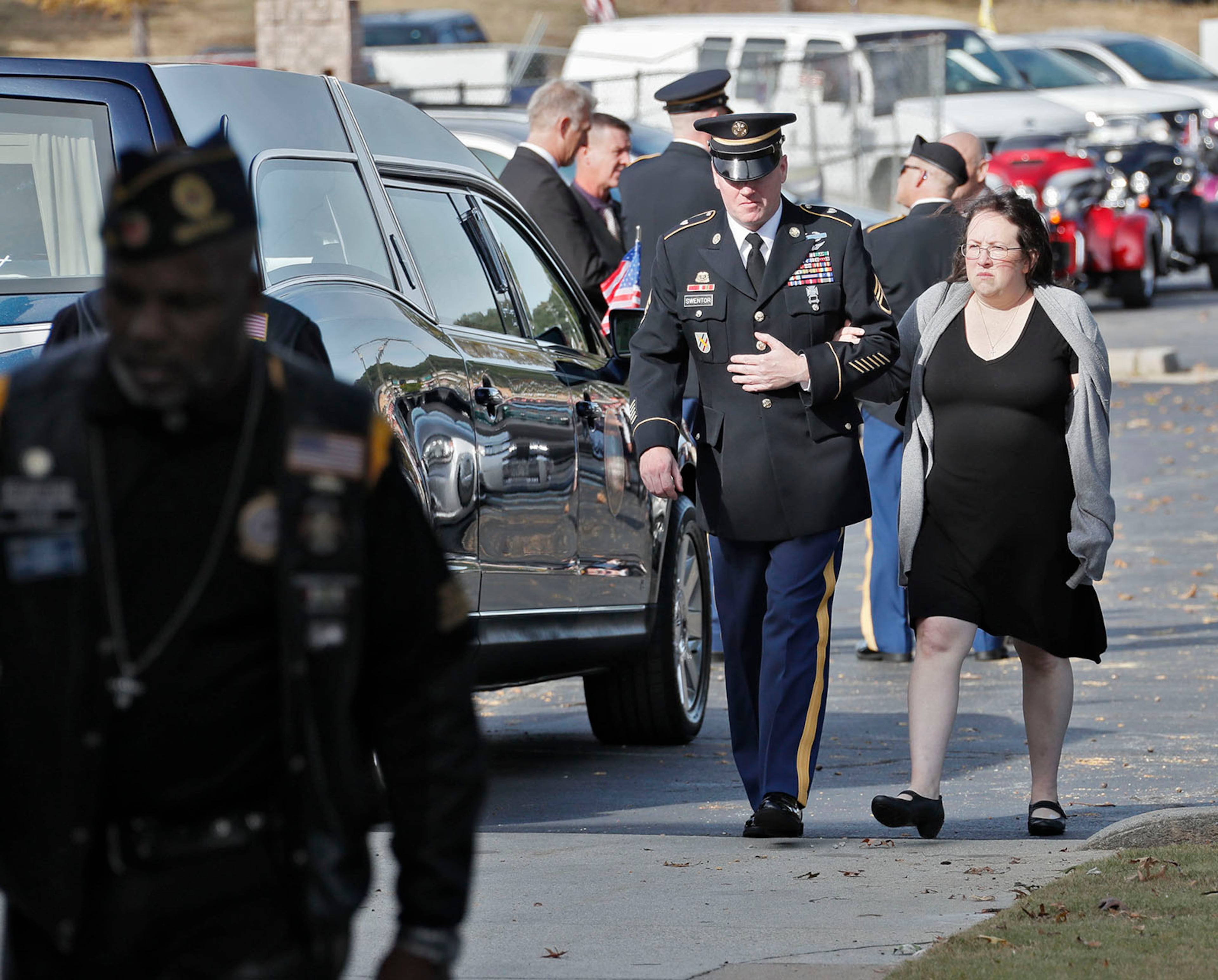 October 18, 2019 - Snellville - A family member is escorted into the church. The funeral for Master Sgt. Mark Allen was held. Friday at the First Baptist Church of Snellville. Allen died Saturday, ten years after he was shot while searching for a soldier who deserted his post in Afghanistan. He was 46. Bob Andres / robert.andres@ajc.com