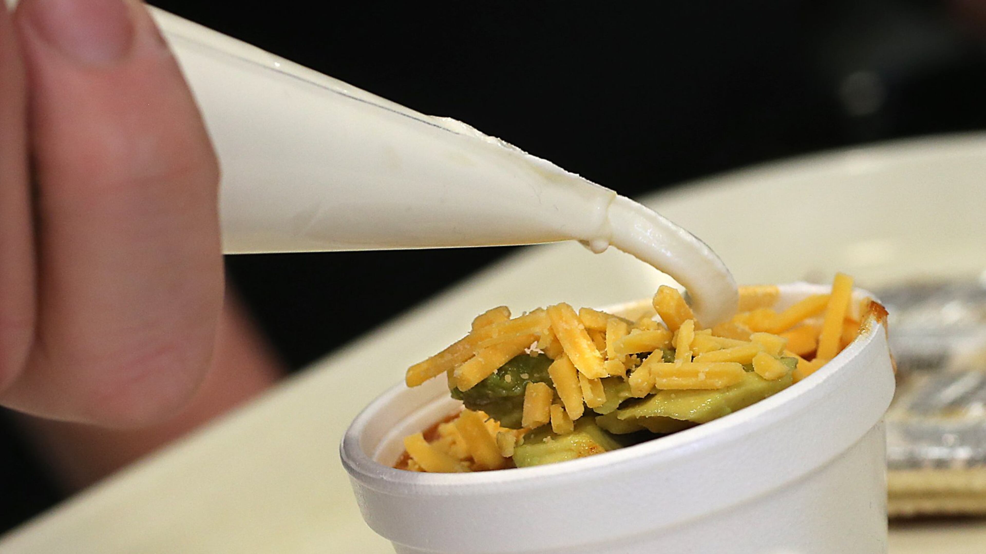 The City of Akron Human Resources Department’s “Wholly Chili” is served at the 11th Annual Akron Firefighters Chili Challenge at Lock 3 Park on January 20, 2017, in Akron, Ohio. From left are Lt. Sierjie Lash, Capt. Scott Pascu, and Firefighter Adam Lovell. (Phil Masturzo/Akron Beacon Journal/TNS)