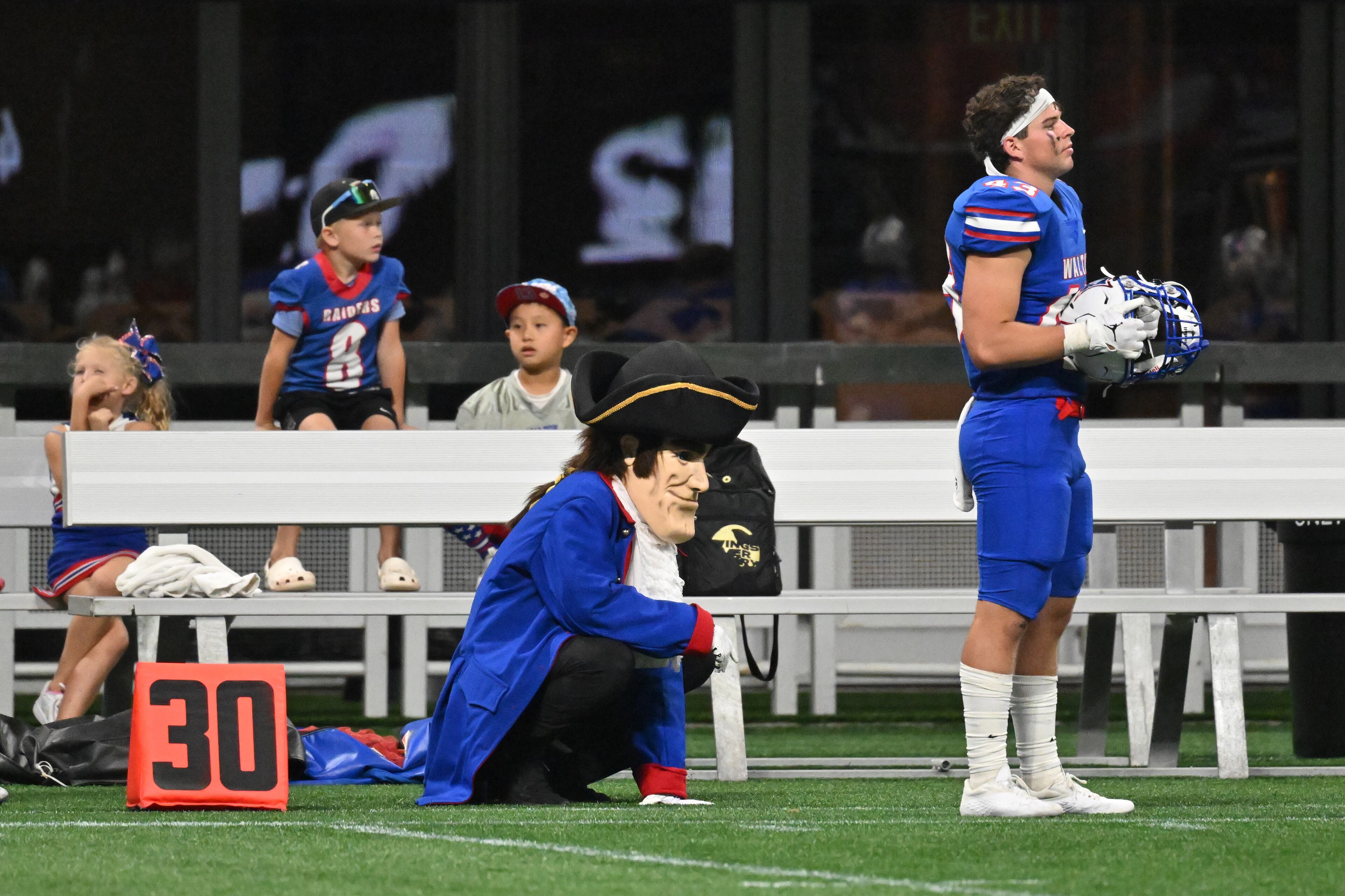 Walton players, fans and a mascot react at the end of the 4th quarter during the 2022 Corky Kell Classic at Mercedes Benz Stadium on Saturday, August 20, 2022. Mill Creek won 44-41 over Walton. (Hyosub Shin / Hyosub.Shin@ajc.com)