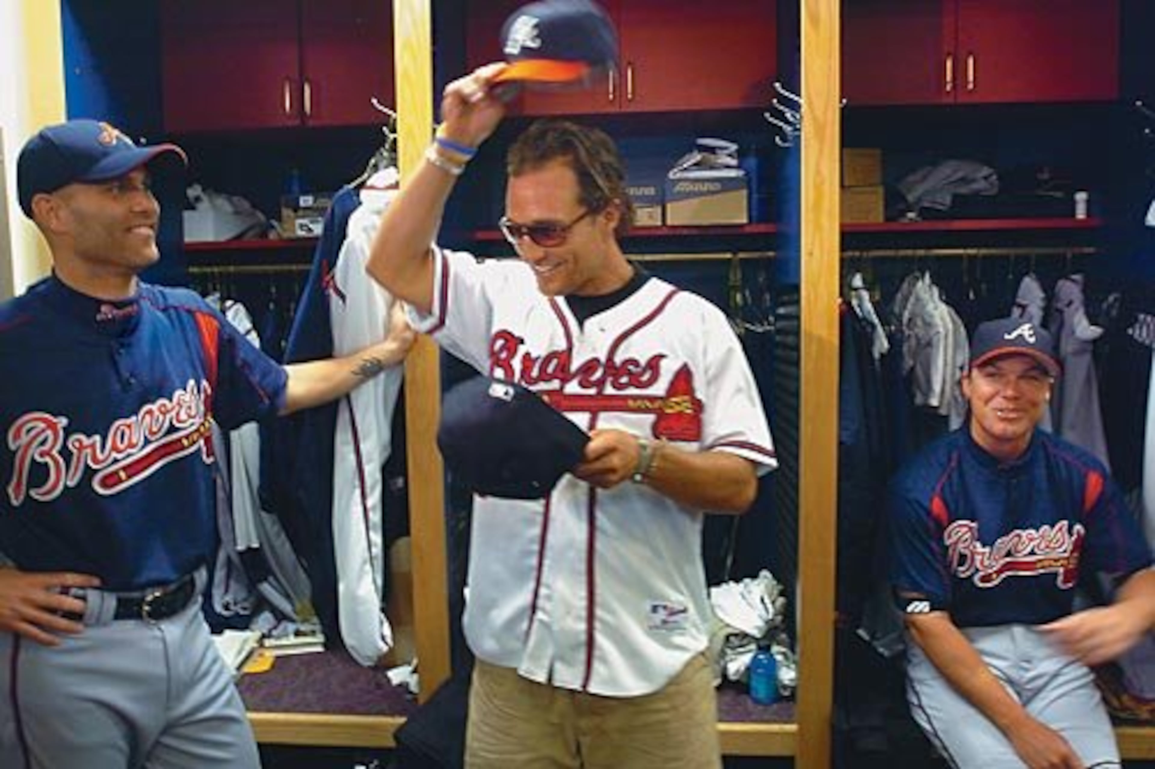 But Atlanta fans perhaps didn't know they were also getting a guy who could handle himself with actor Matthew McConaughey (center) at his first Braves spring camp in 2005.