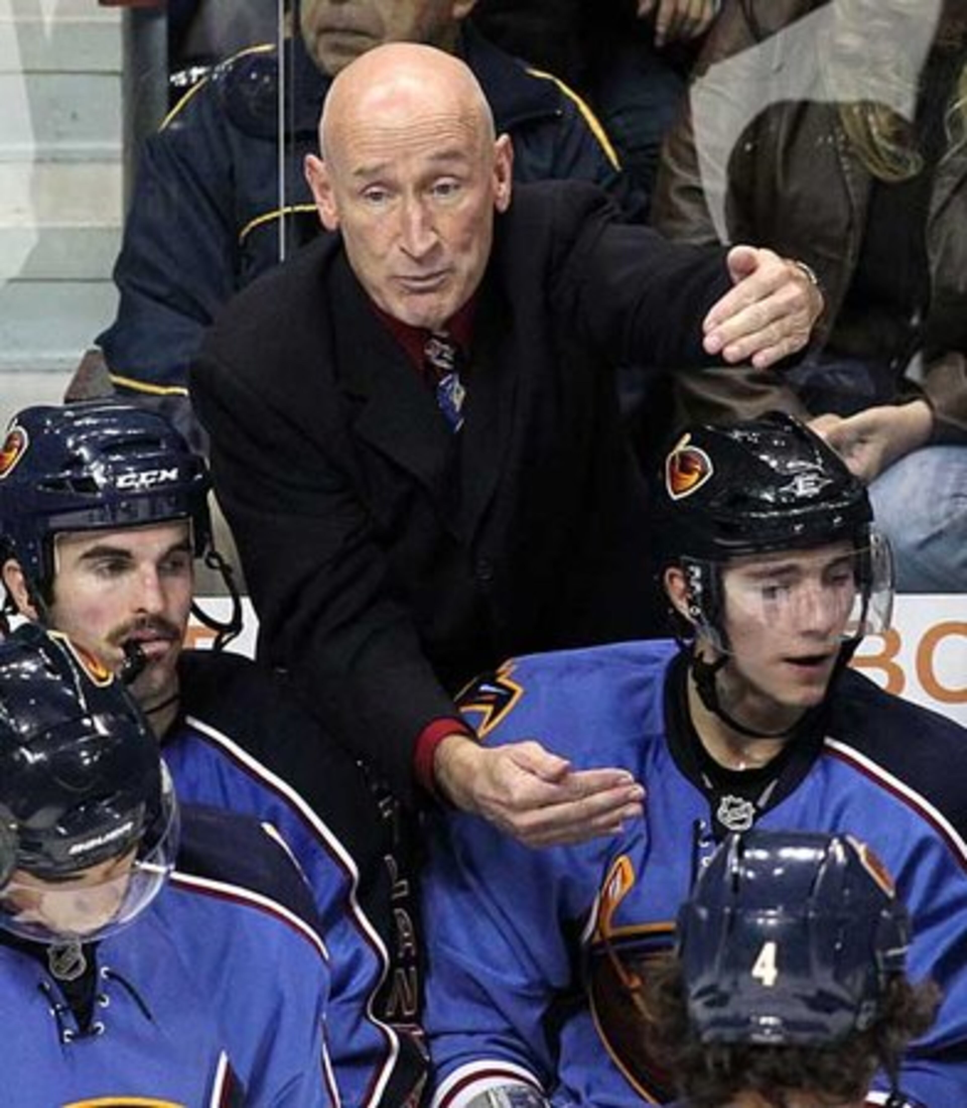 Atlanta Thrashers head coach Craig Ramsay coaches up his players during a timeout against the New York Islander during the 3rd period.