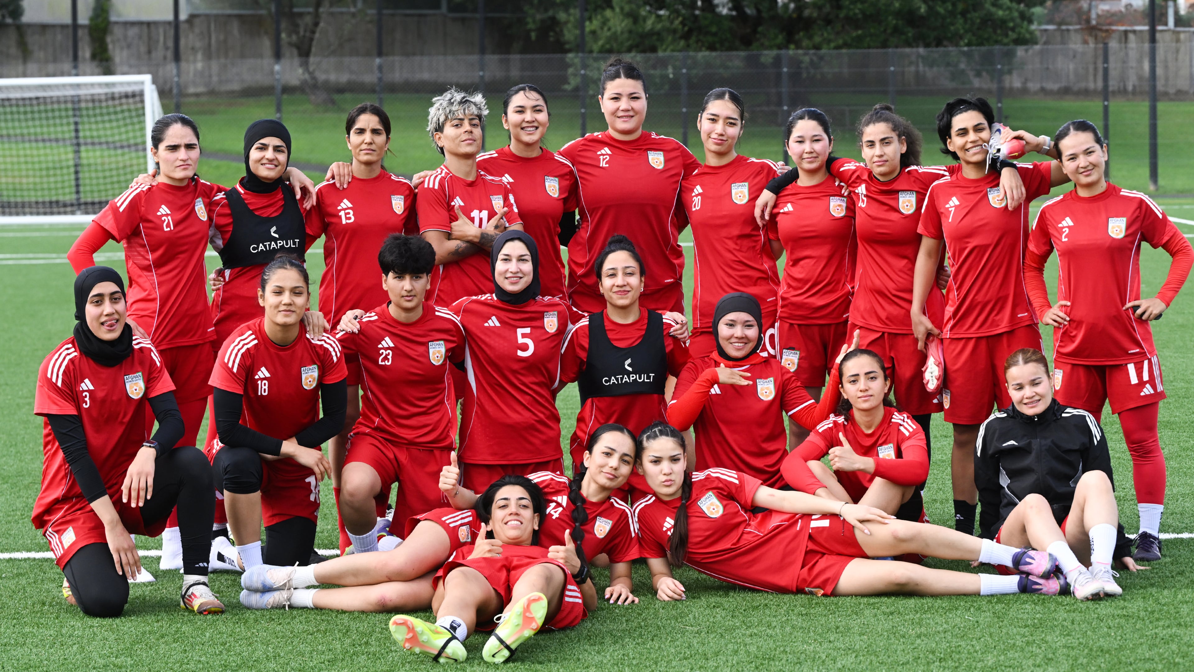 Afghan women's players pose for a team photo during a training session in Auckland, New Zealand, Tuesday, June 2, 2026. (Andrew Cornaga/Photosport via AP)