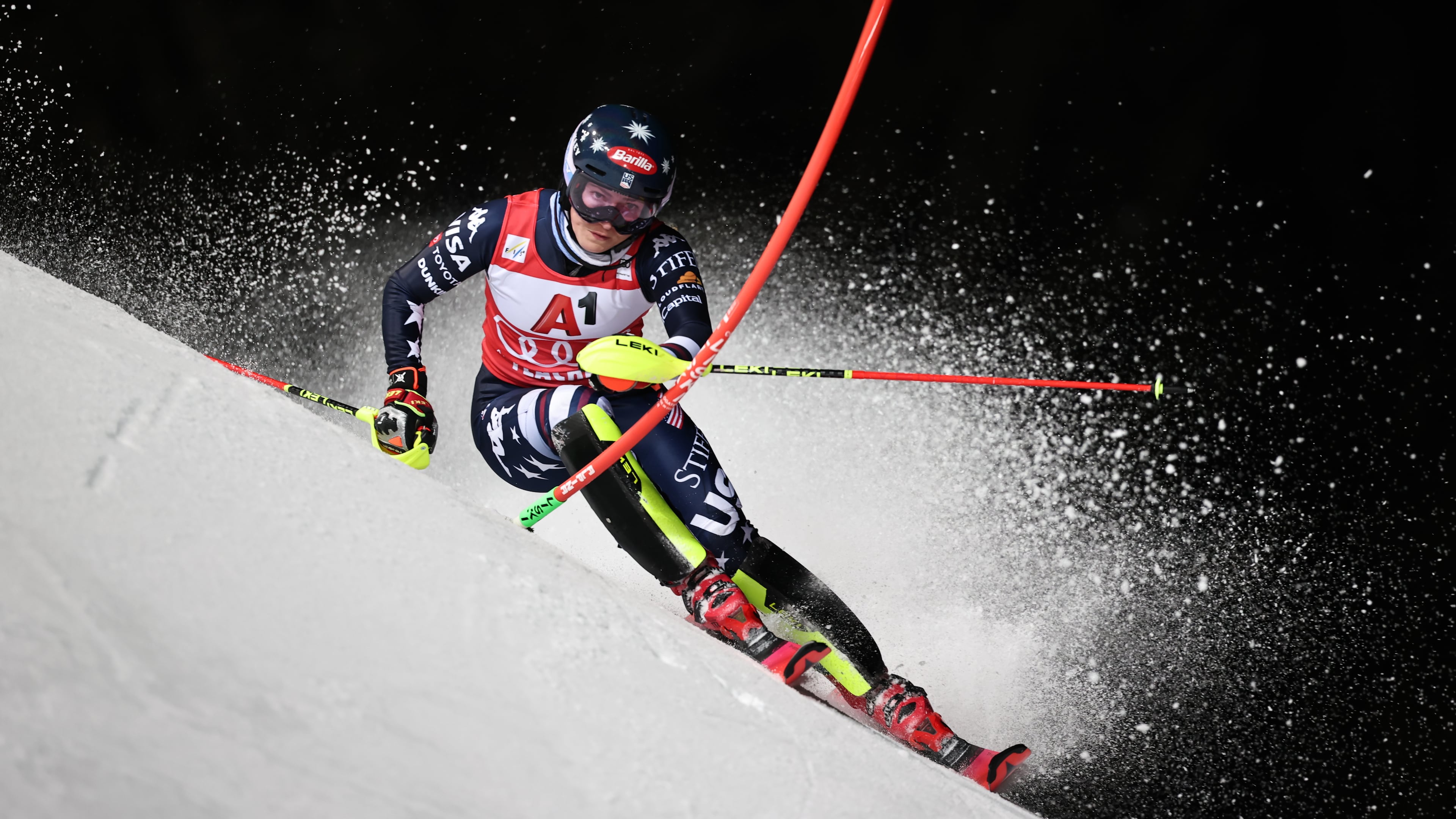 United States' Mikaela Shiffrin speeds down the course during an alpine ski, women¥s World Cup slalom, in Flachau, Austria, Tuesday, Jan. 13, 2026. (AP Photo/Marco Trovati)