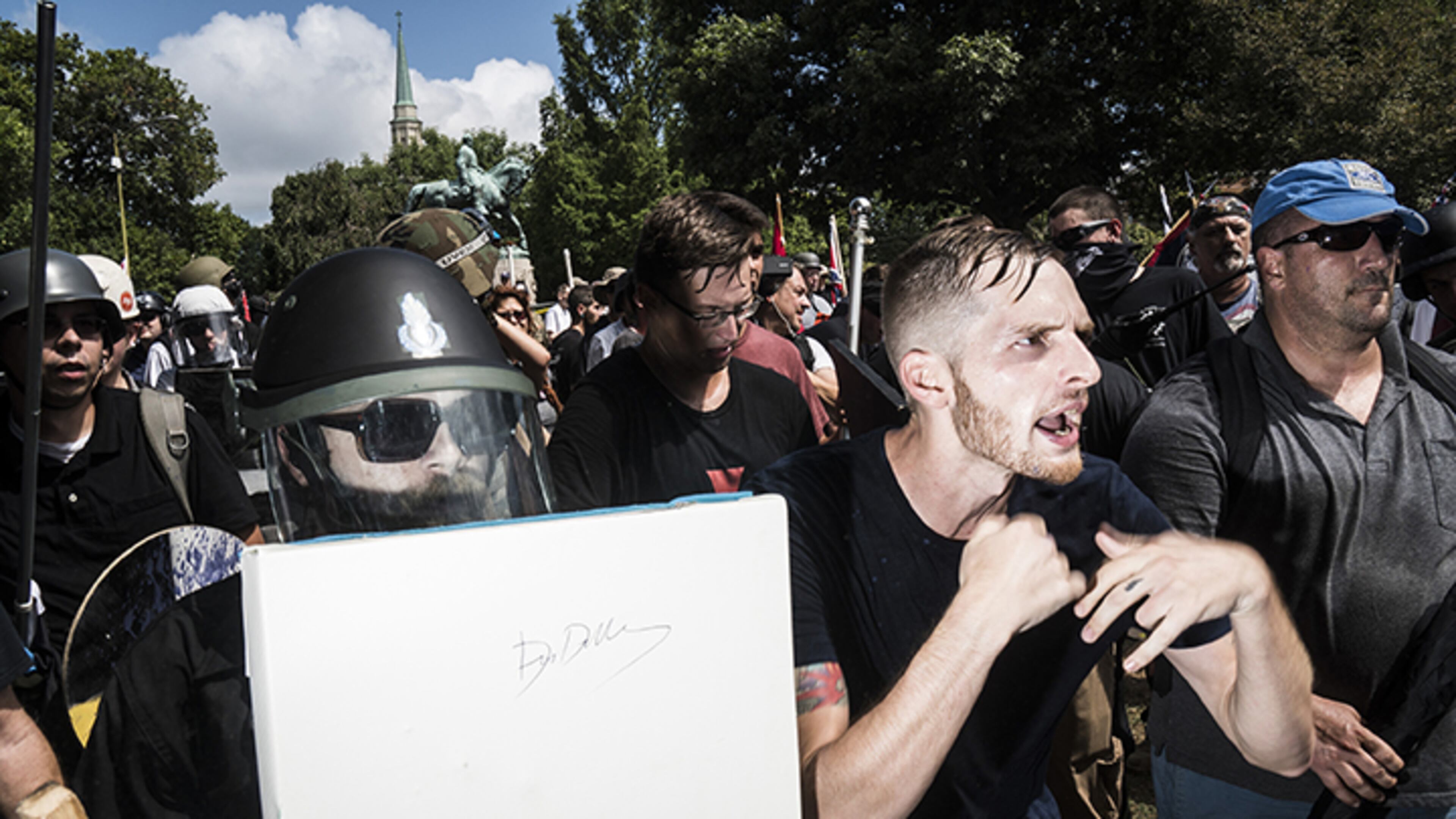 Alt-right rally members on Saturday Aug. 12, 2017 in Lee Park in Charlottesville, Va.