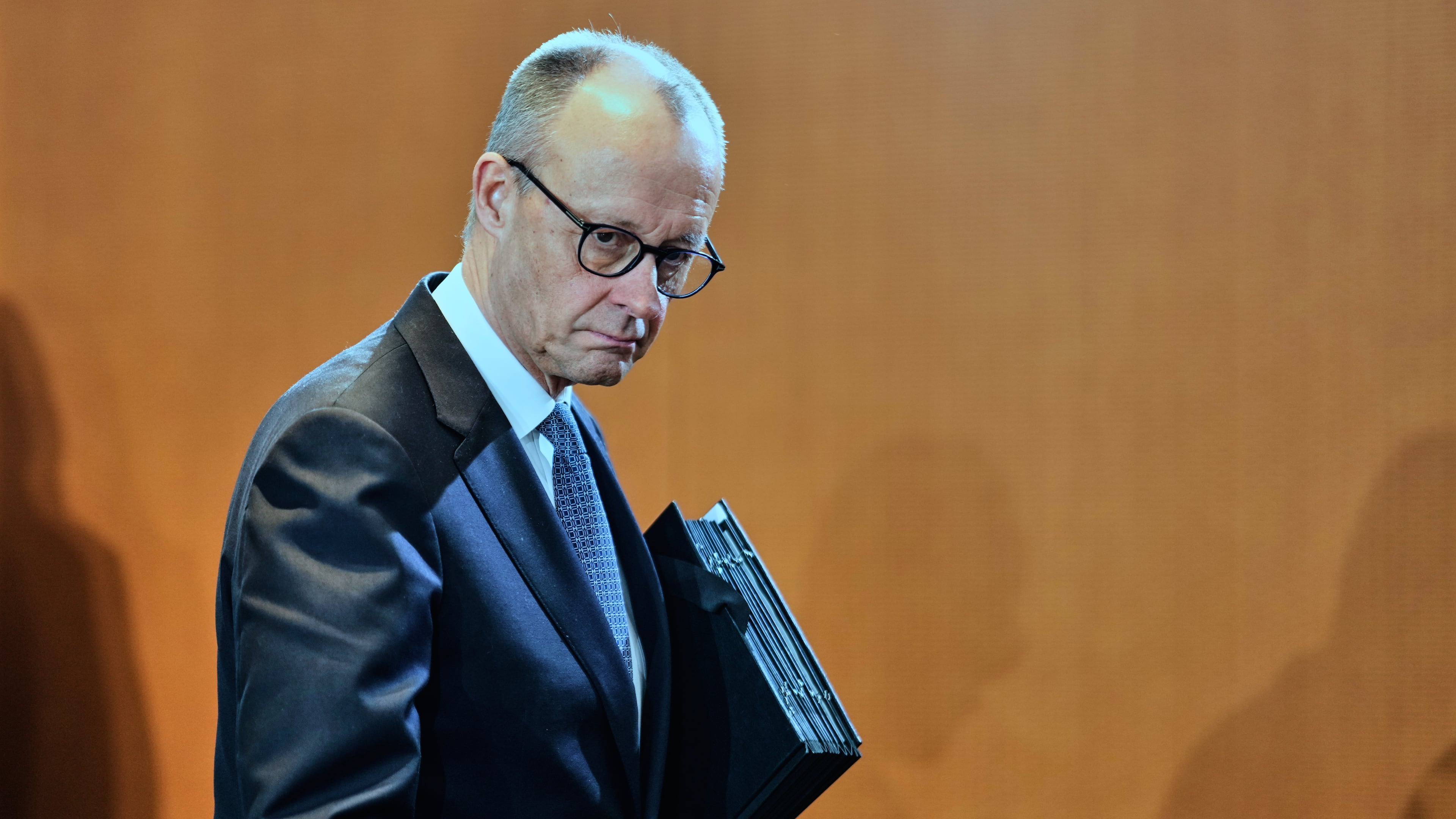 German Chancellor Friedrich Merz arrives for the cabinet meeting at the chancellery in Berlin, Germany, Wednesday, Jan. 28, 2026. (AP Photo/Markus Schreiber)