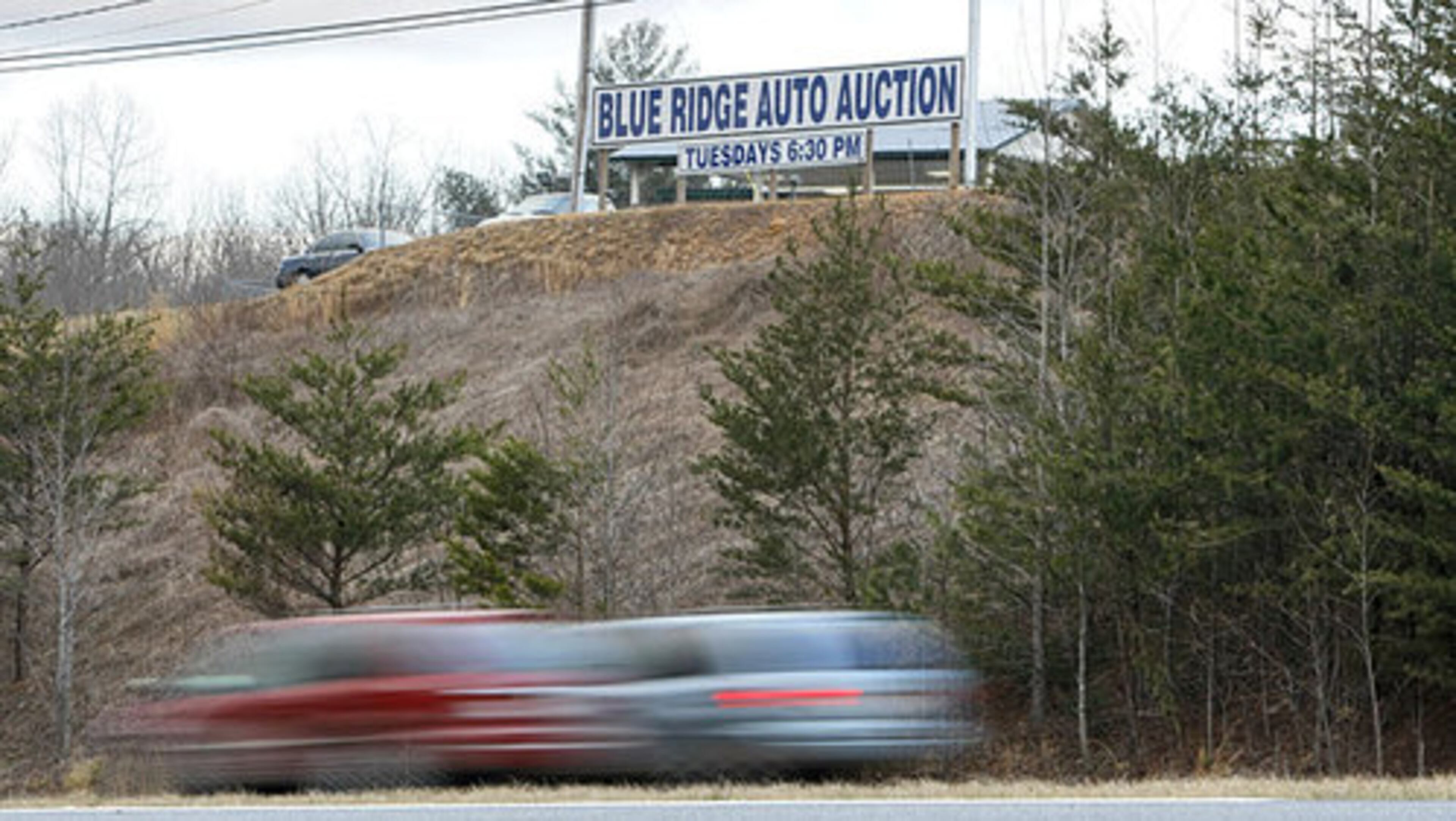 Cars whiz by Blue Ridge Auto Auction on Highway 515S at Whitepath Road. Four people were flown to Atlanta Medical Center and North Fulton Hospital, Wright said. One person was flown to Erlanger Hospital in Chattanooga and another was flown to Hamilton Medical Center in Dalton, he said.